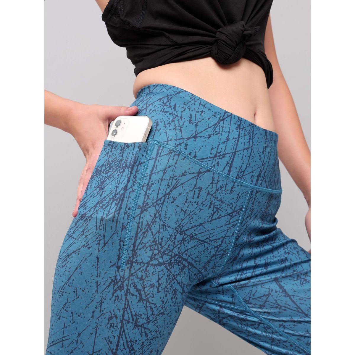 بنطال ضيق بطبعات تاي داي وجيوب تكنوسبورت × ستايلي-women-clothing-sportswearandactivewear-bottoms-image-8