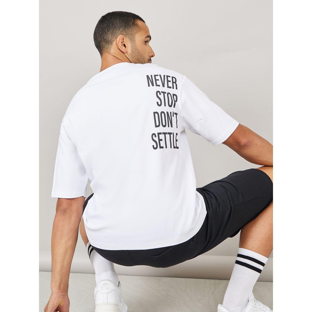 Styli Streetwear Front and Black Slogan Print Oversized Interlock T-Shirt-men-clothing-tshirtsandpolos-tshirts-image-1