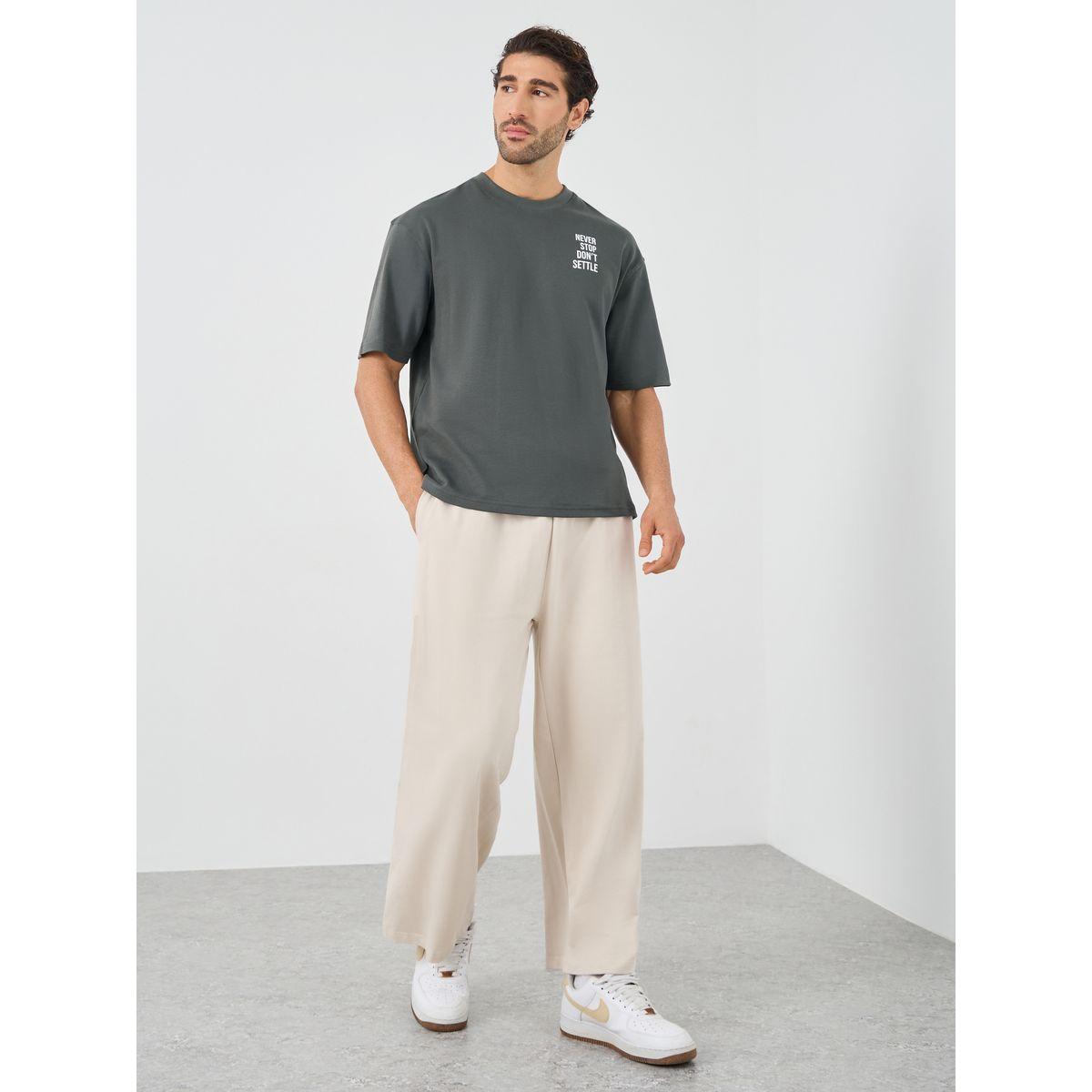 تيشيرت فضفاض بياقة دائرية وطبعة كتابة-men-clothing-tshirtsandpolos-tshirts-image-3
