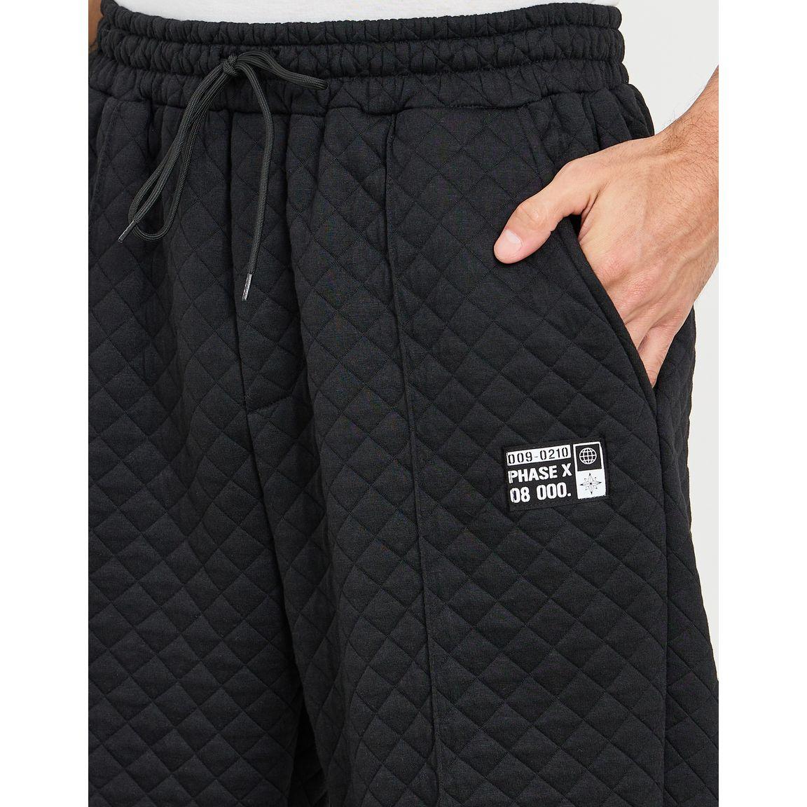 بنطال بقصة مريحة ومزين بشارة-men-clothing-bottoms-trousersandchinos-trousers-image-4