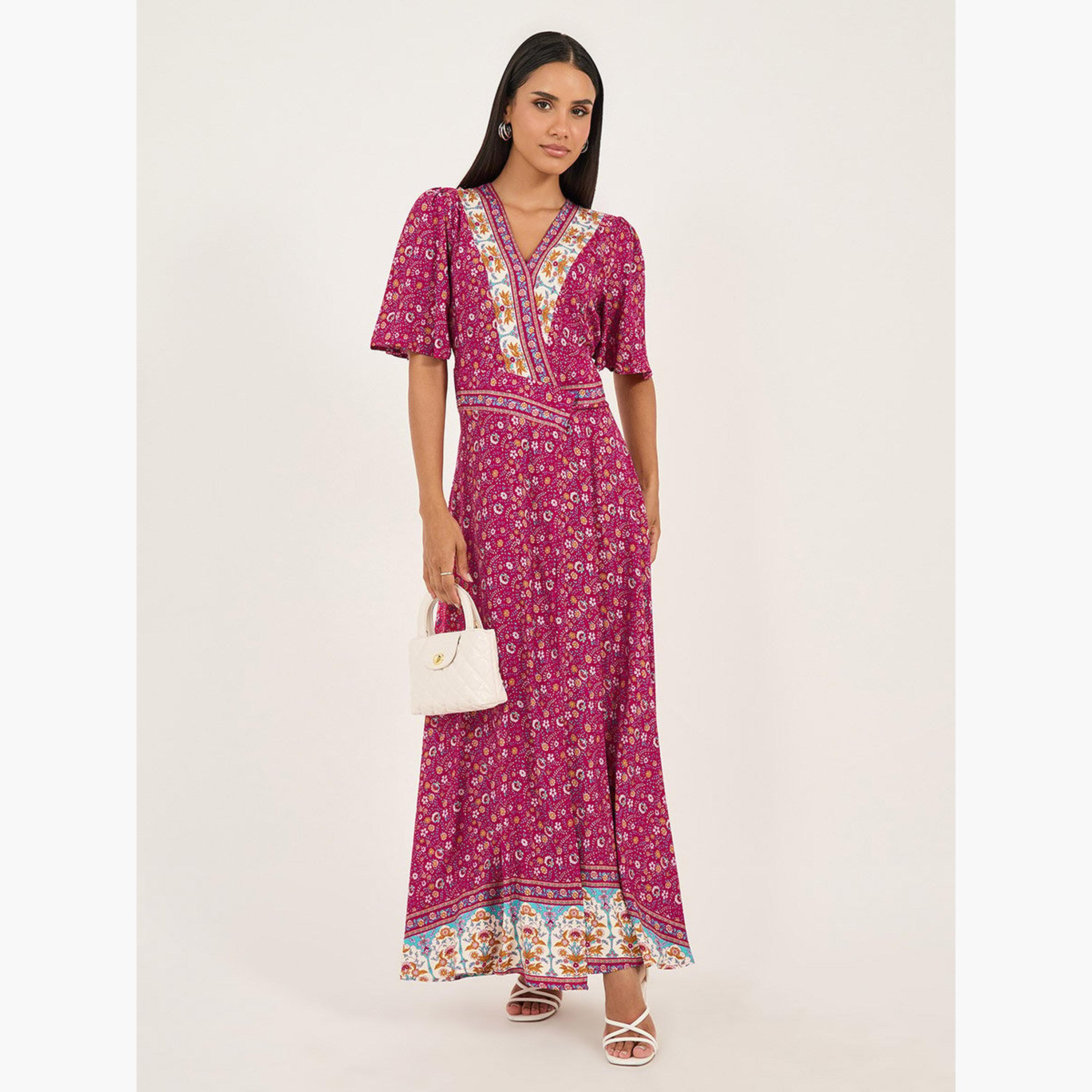 ستايلي - فستان ماكسي ملفوف بفتحة رقبة على شكل حرف V ومطبوع بالكامل-women-clothing-dresses-image-1