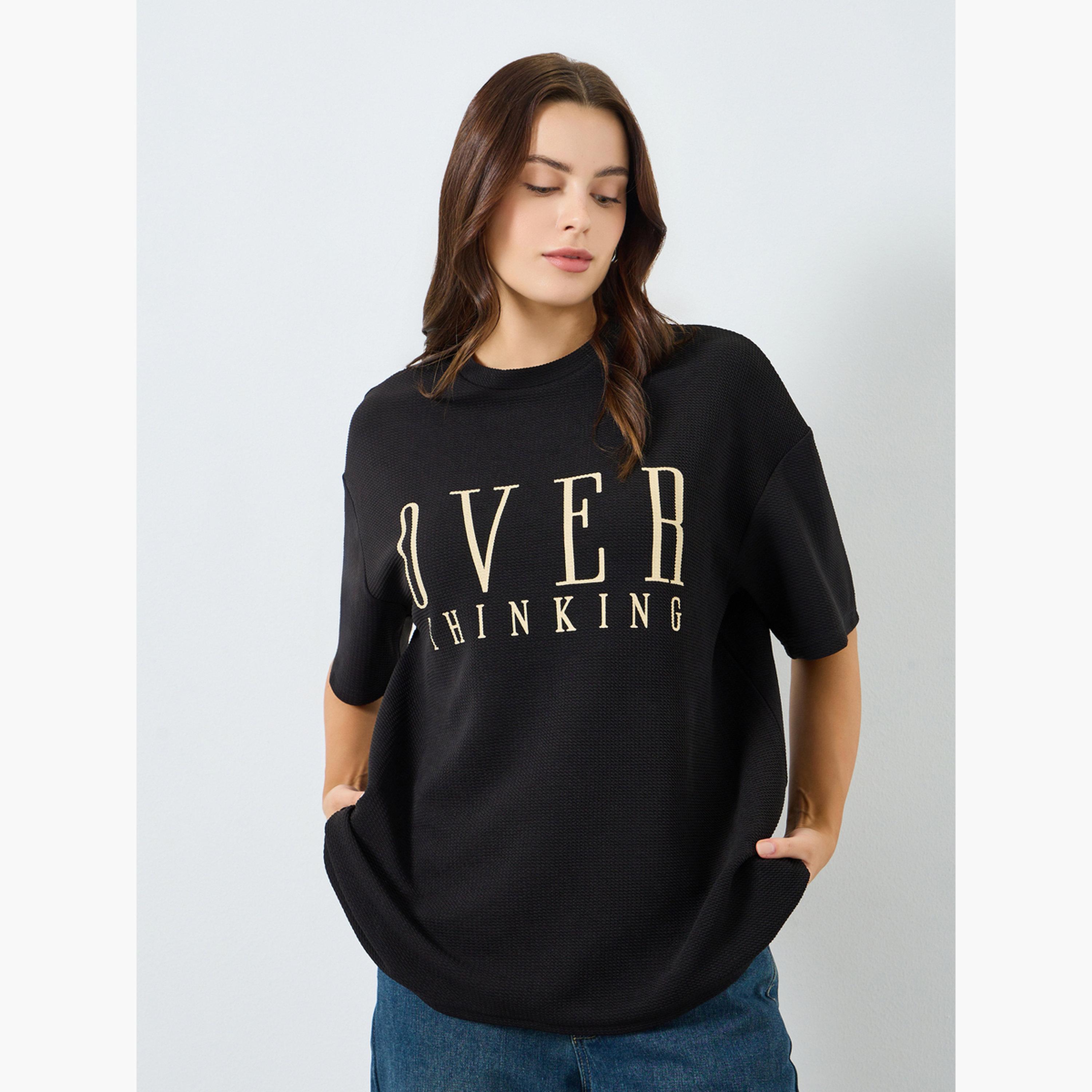 تيشيرت واسع بطبعة شعار-women-clothing-tshirts-image-1