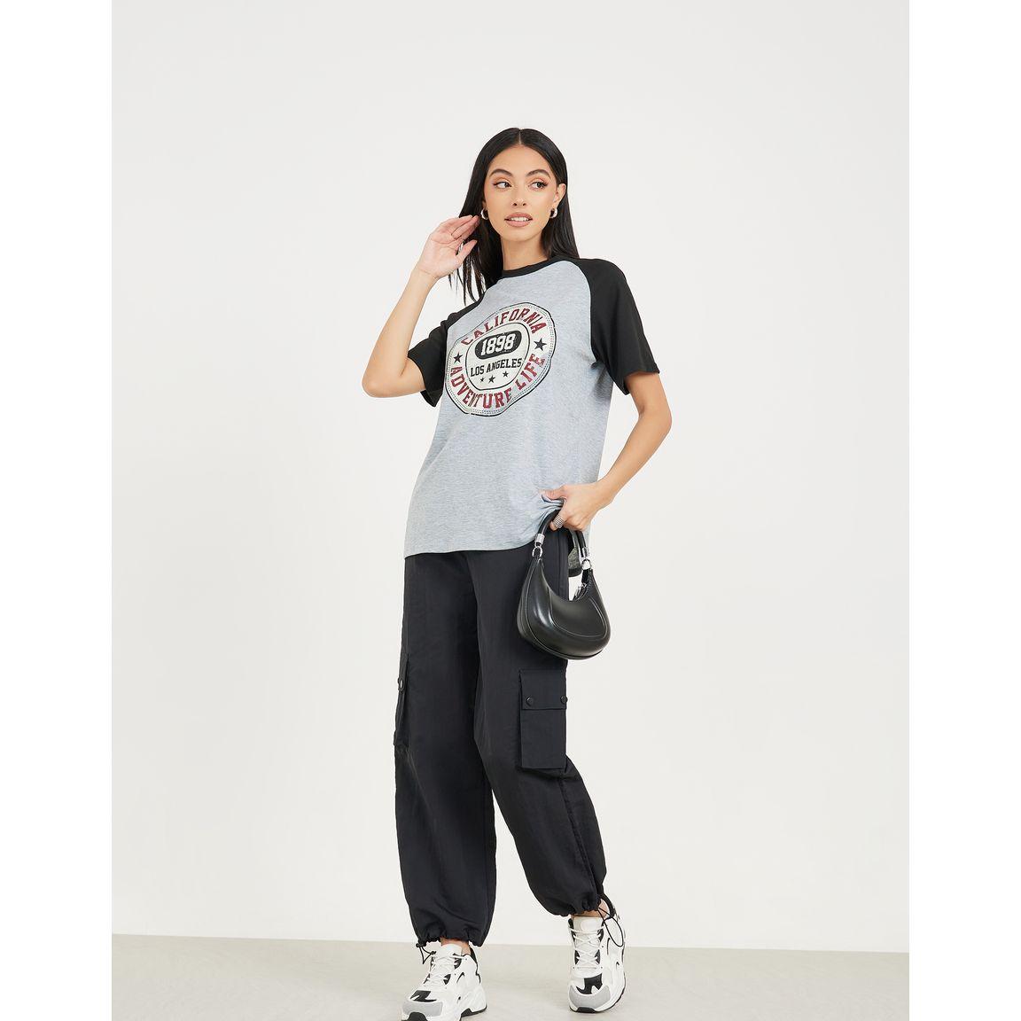 تيشيرت واسع مطبع بطبعة جرافيك-women-clothing-tshirts-image-2