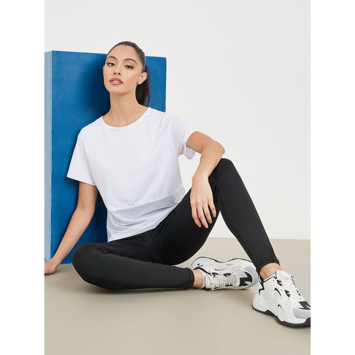 مجموعة من ليقنز رياضي مع بلوزة بتفاصيل شبك-women-clothing-sportswearandactivewear-trackpantsandtracksuits-image-1