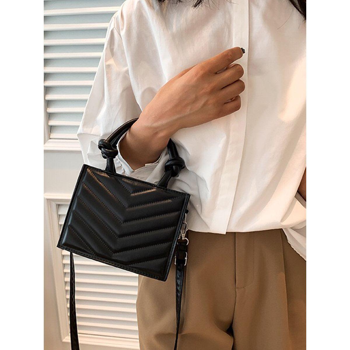 شنطة يد بتفاصيل بارزة الملمس-women-bagsandwallets-handbags-image-1