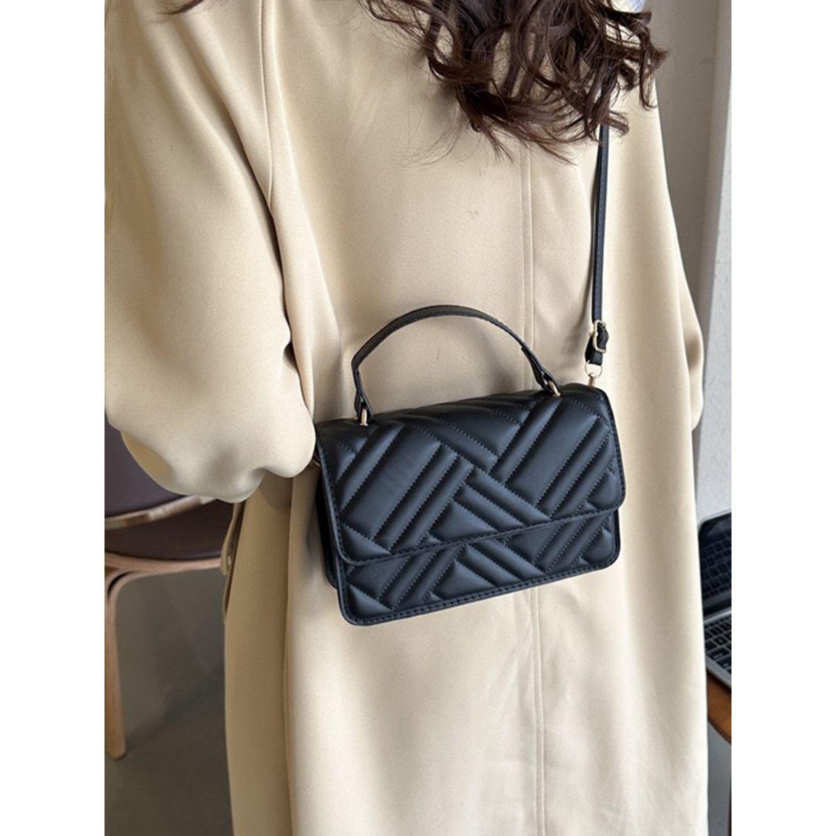 شنطة يد بتفاصيل بارزة الملمس-women-bagsandwallets-handbags-image-1