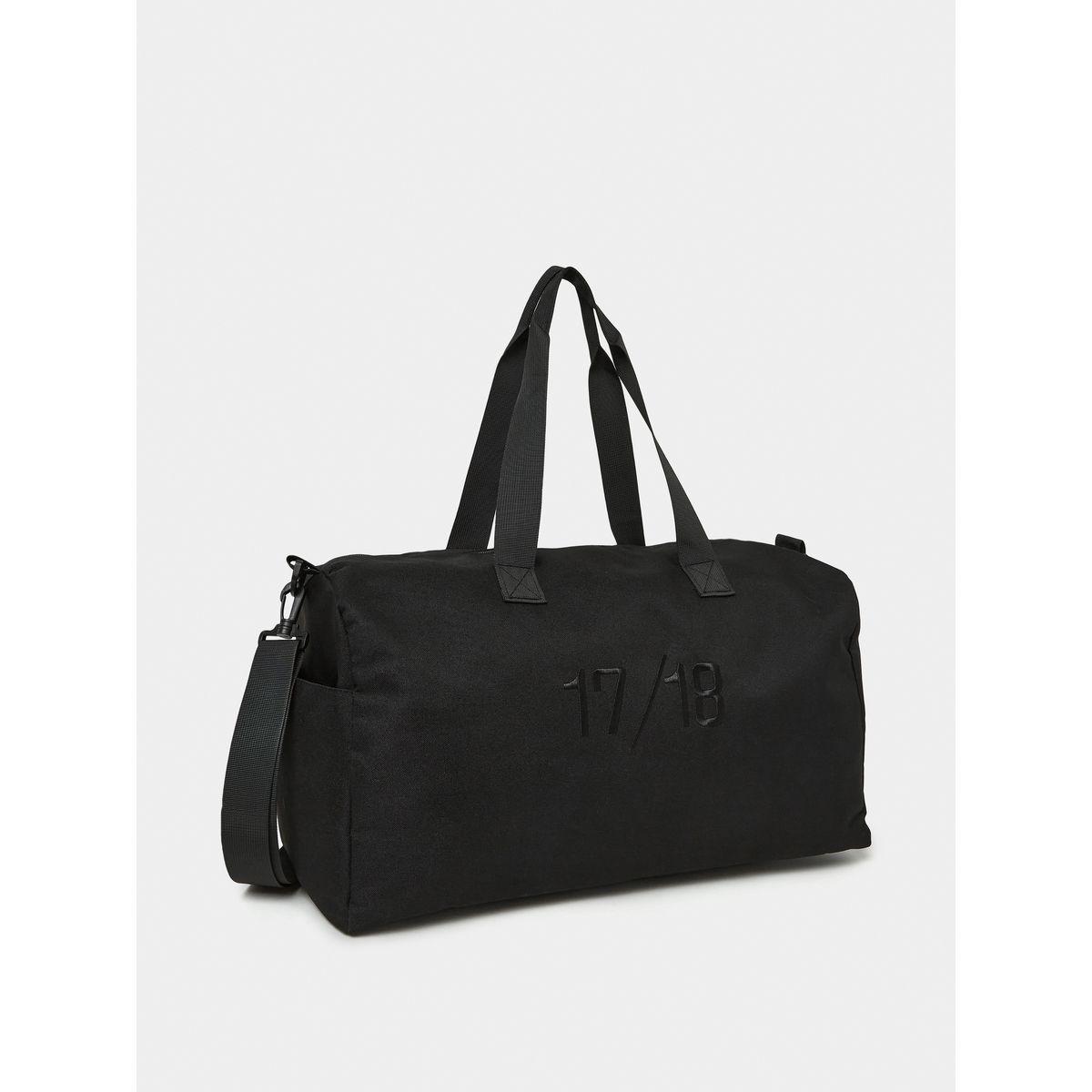 شنطة دافل بتفاصيل مُطرّزة-travel-luggagesandbags-dufflebags-image-1