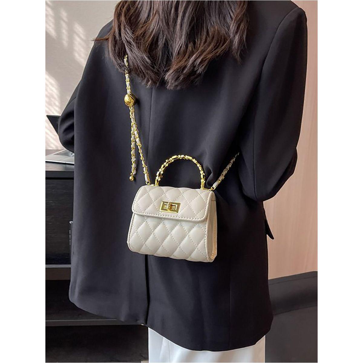 شنطة يد بتفاصيل بارزة الملمس-women-bagsandwallets-handbags-image-1