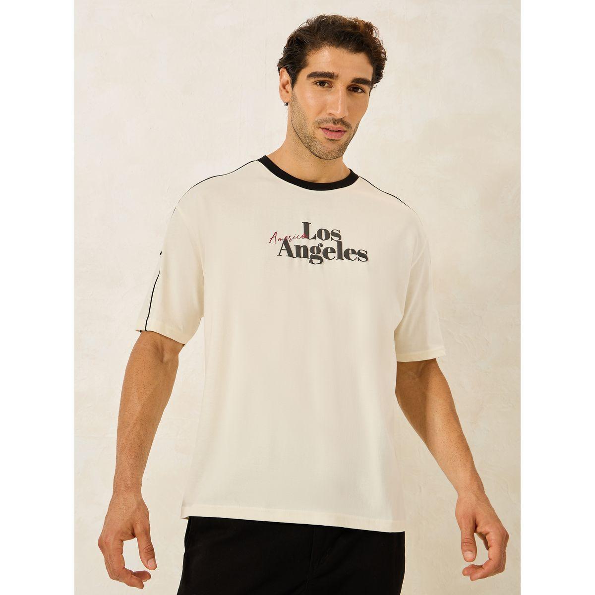 تيشيرت فضفاض بتفاصيل محزوزة وطبعة جرافيك-men-clothing-tshirtsandpolos-tshirts-image-1