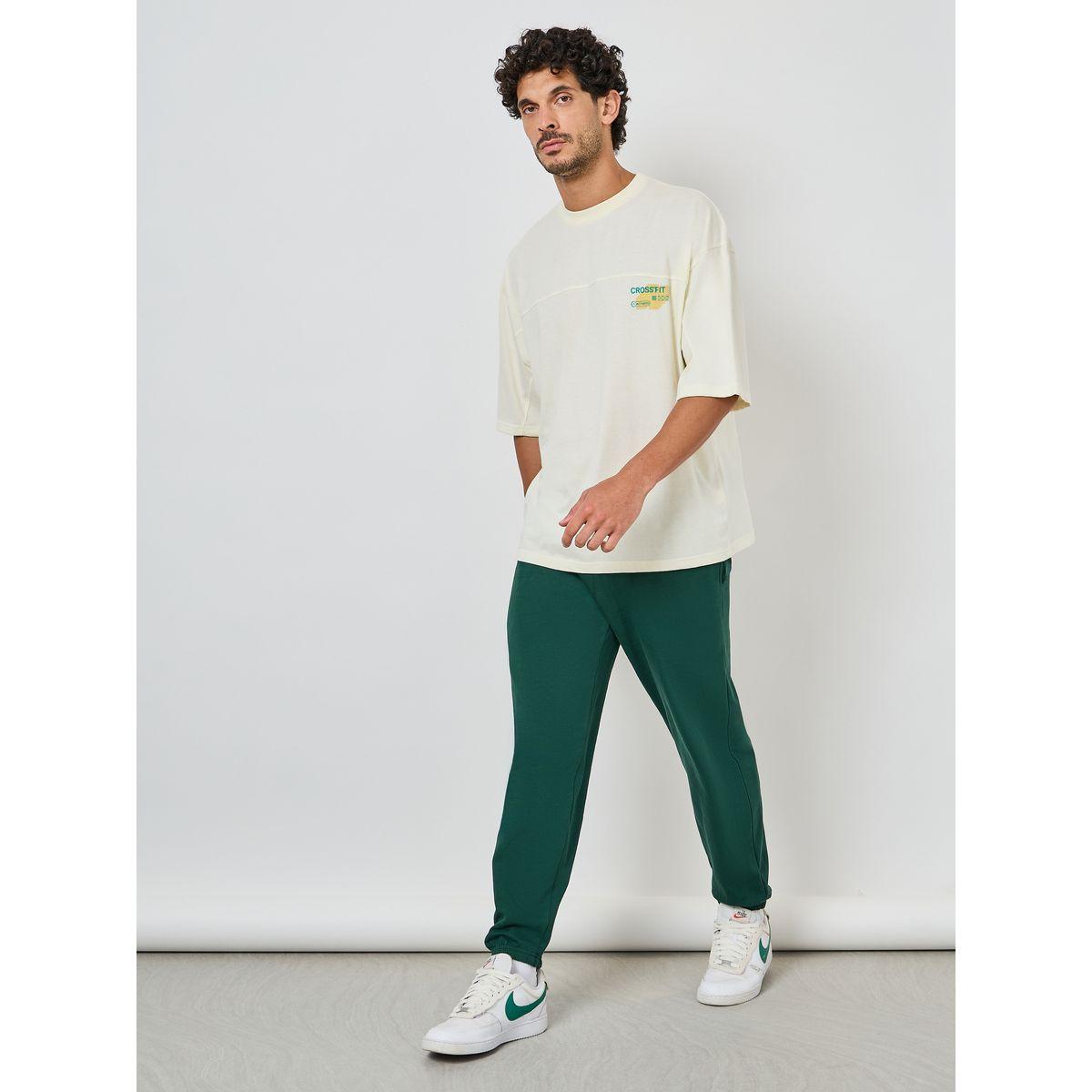 تيشيرت بوكسي مطبع بطبعة كتابة-men-clothing-sportswearandactivewear-tshirtsandpolos-image-2