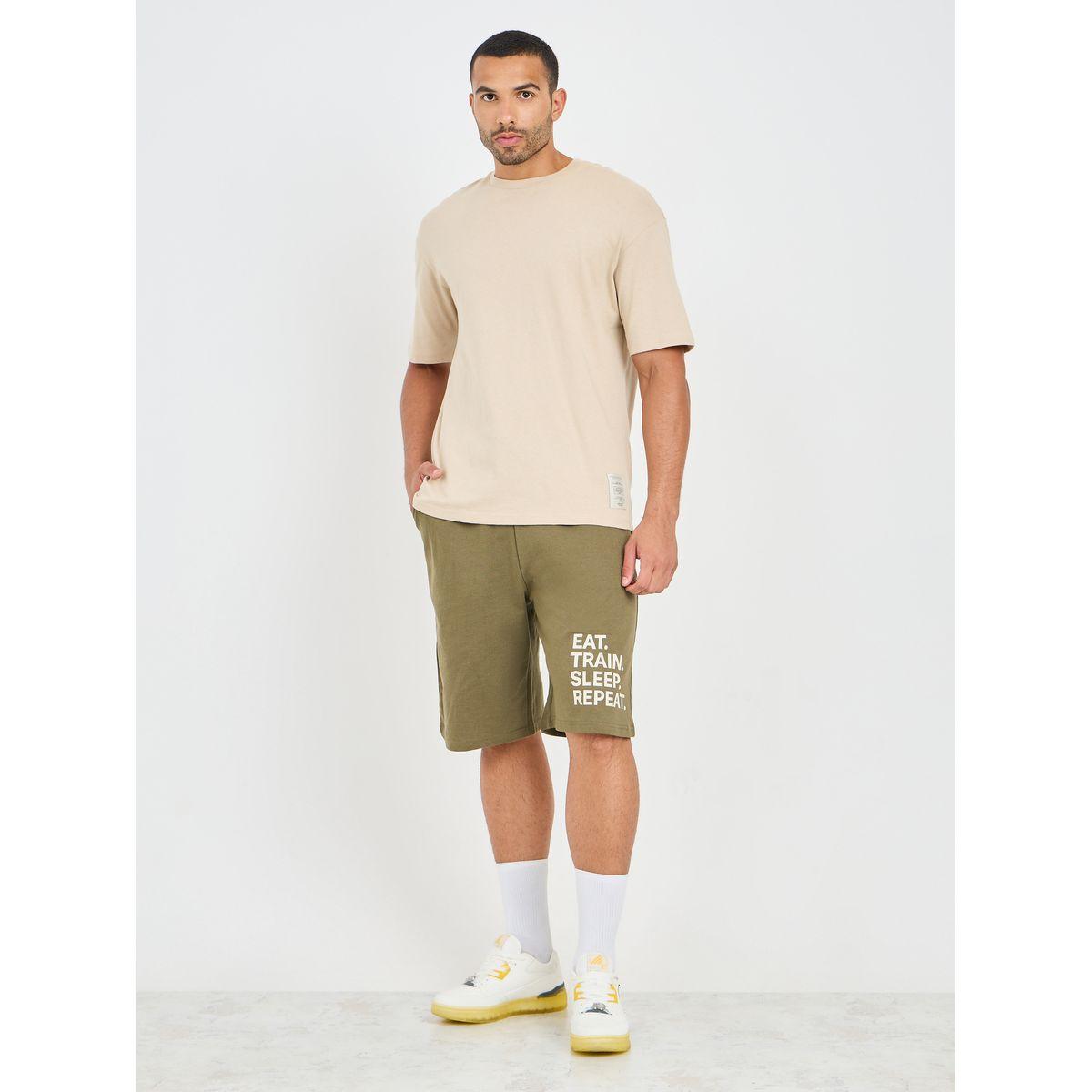 شورت واسع بحافة مطبعة بكتابة-men-clothing-sportswearandactivewear-bottoms-image-2