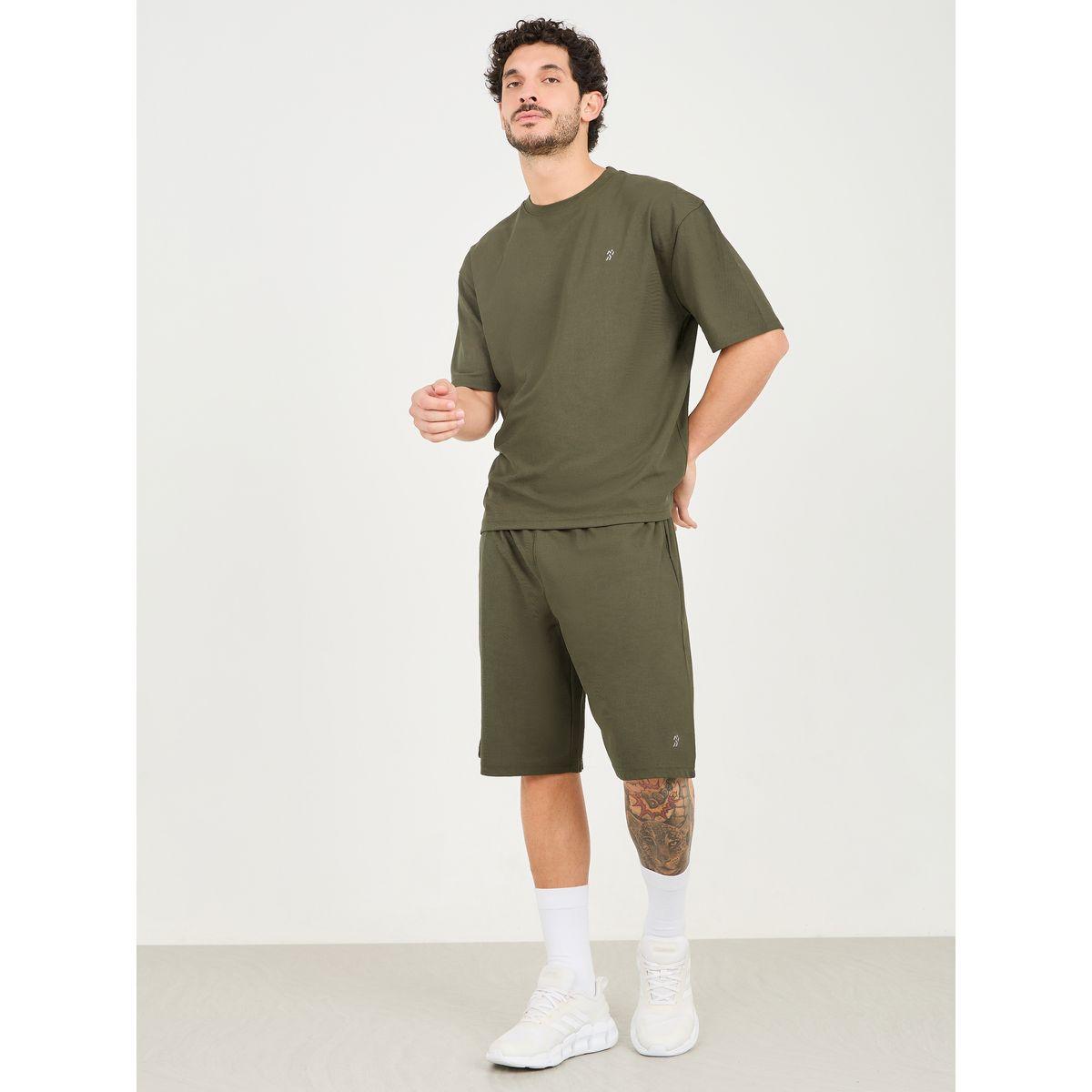 شورت واسع للتدريب بشعار عاكس-men-clothing-sportswearandactivewear-bottoms-shorts-image-2