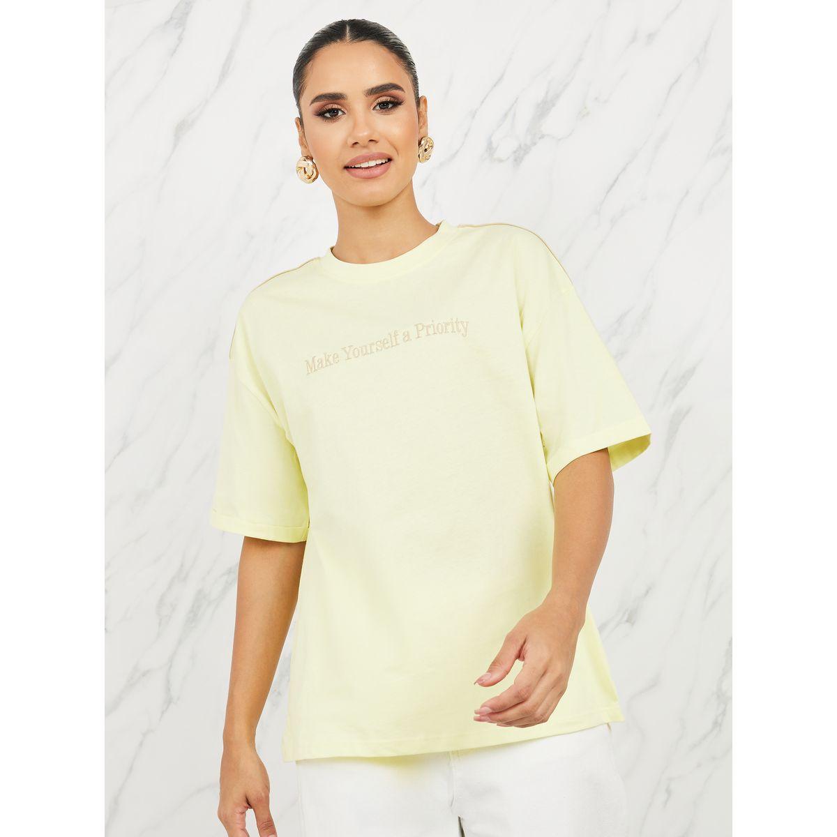 تيشيرت فضفاض بكتابة مُطرّزة-women-clothing-tshirts-image-1