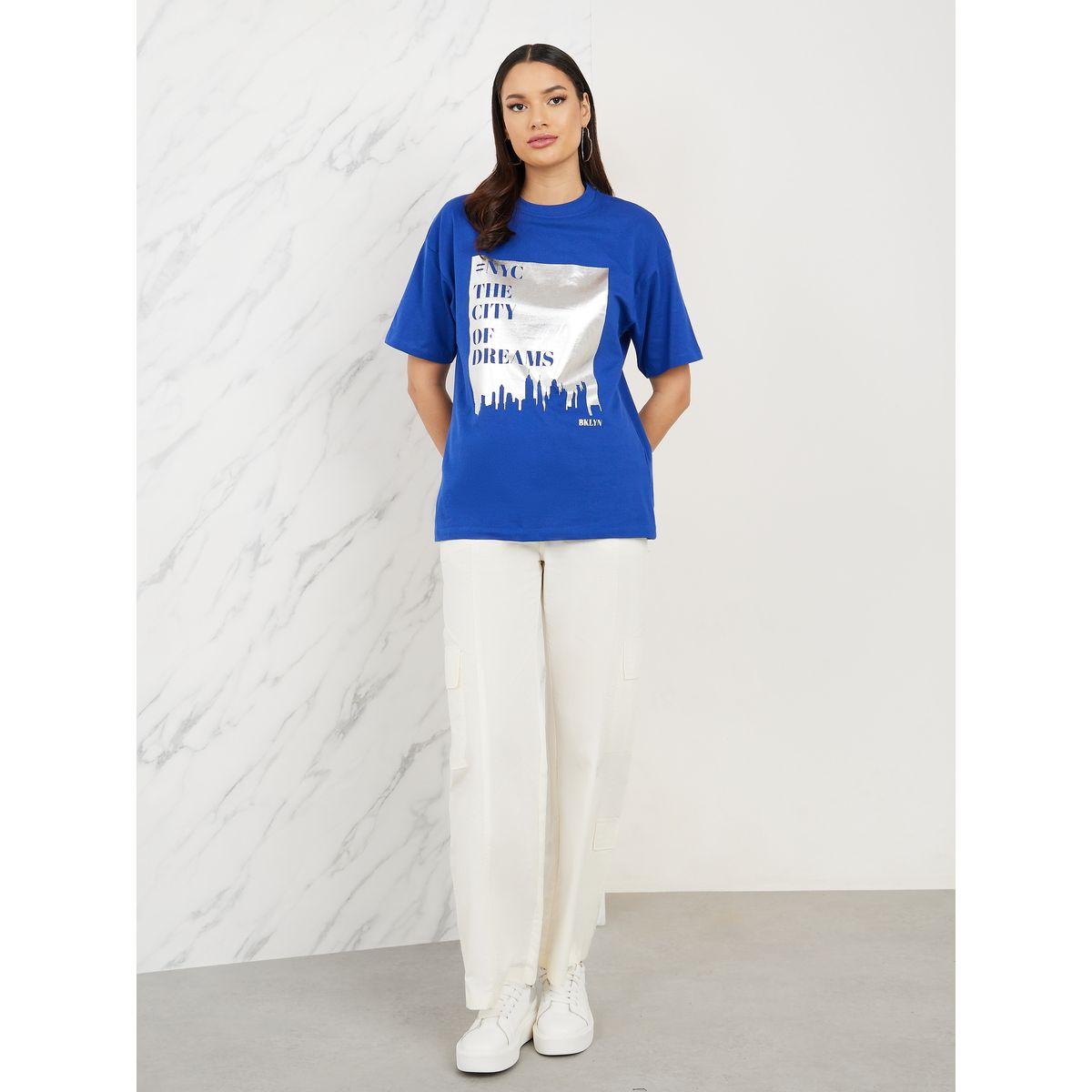 تيشيرت واسع مطبع بطبعة جرافيك-women-clothing-tshirts-image-2