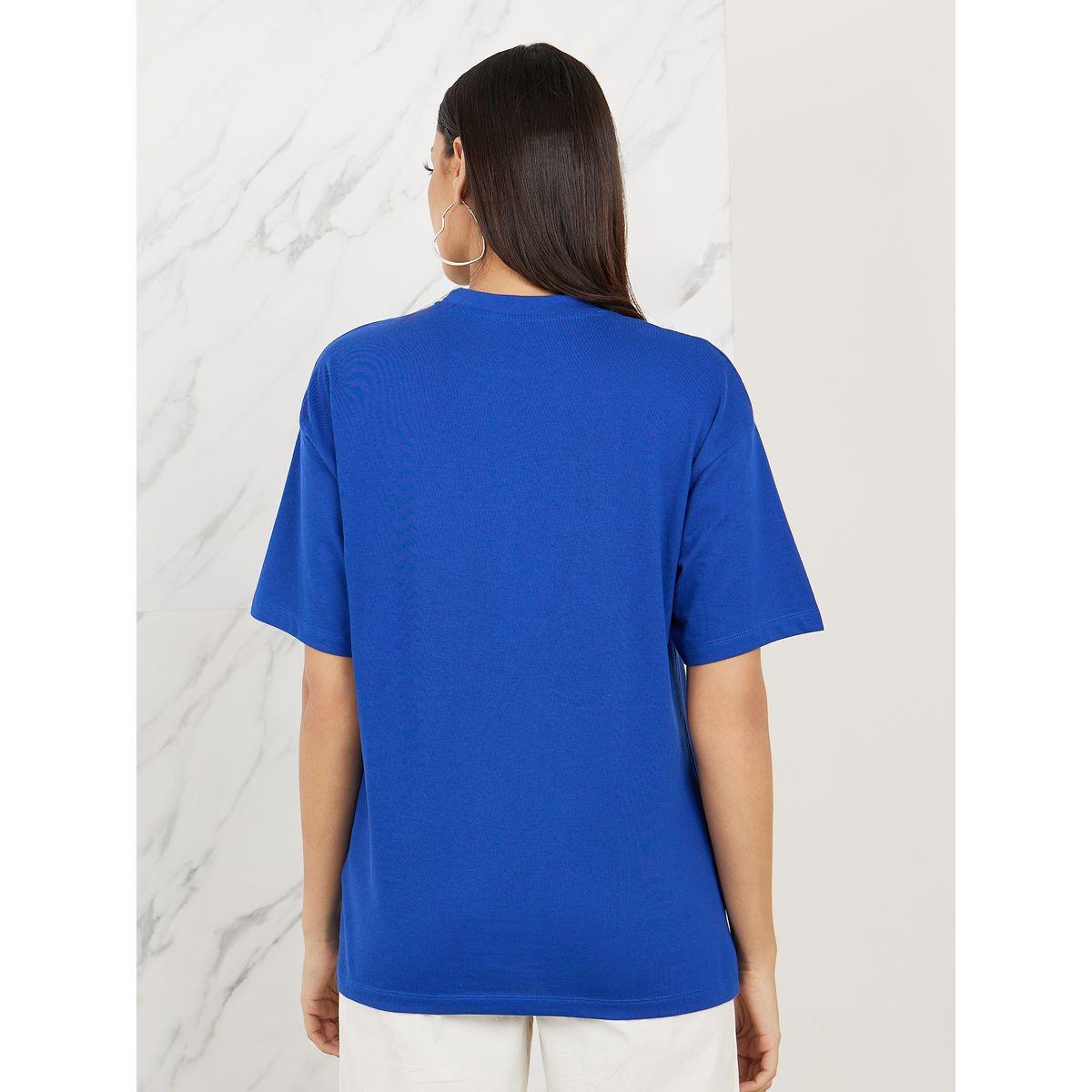 تيشيرت واسع مطبع بطبعة جرافيك-women-clothing-tshirts-image-4