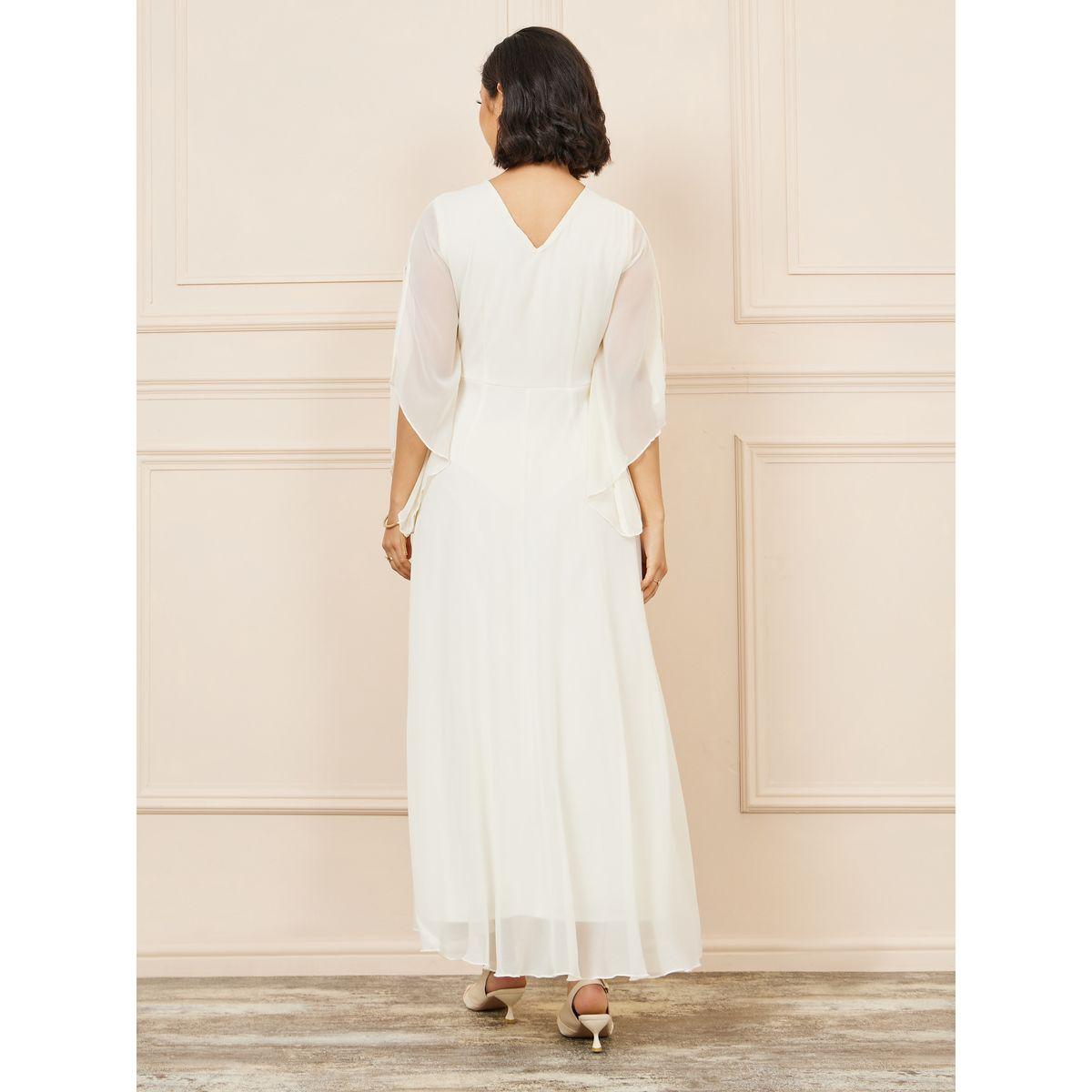 فستان طويل مزين بزهور مع تفاصيل شفافة-women-clothing-dresses-image-4