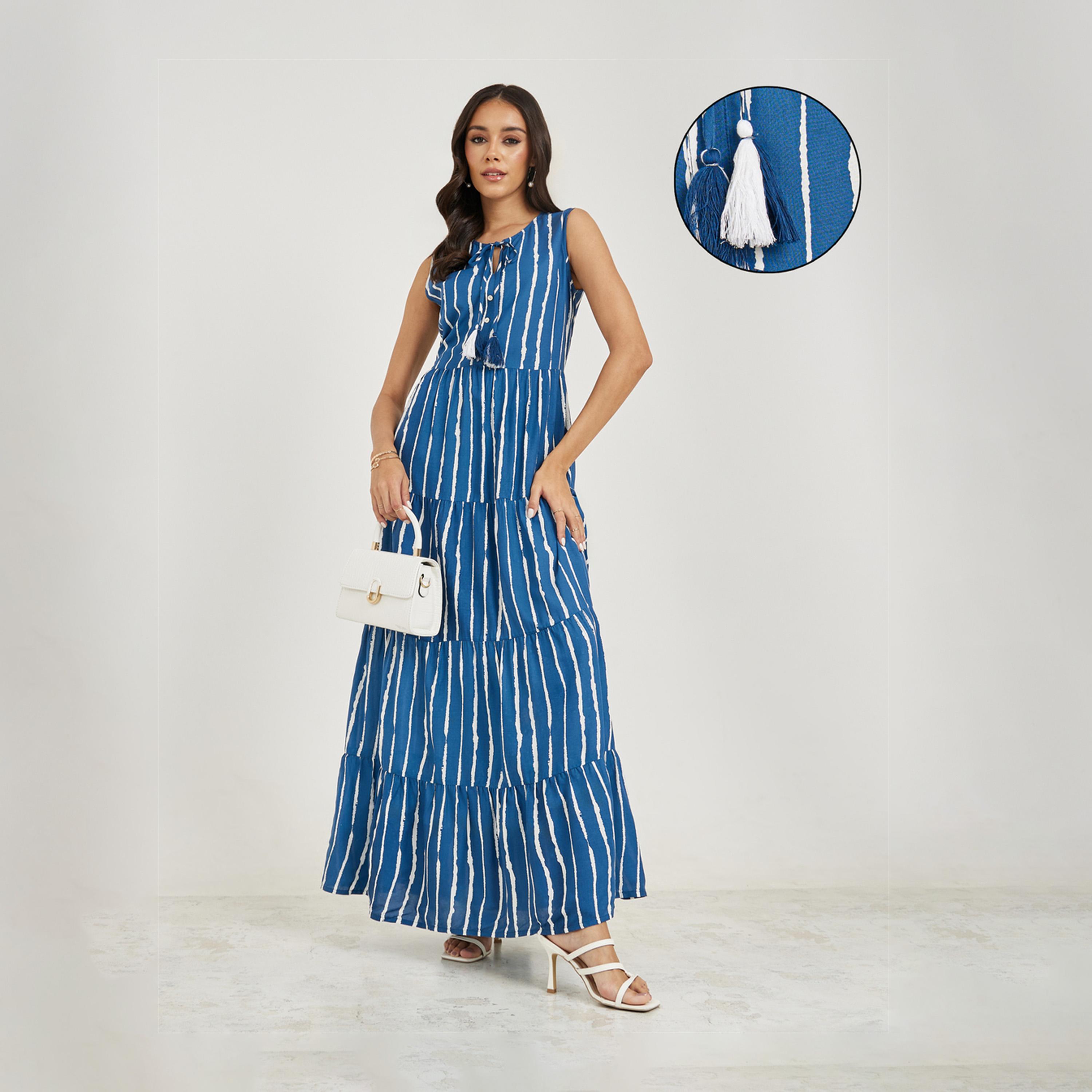 ستايلي - فستان ماكسي متعدد الطبقات بدون أكمام بطبعات كاملة-women-clothing-dresses-image-1