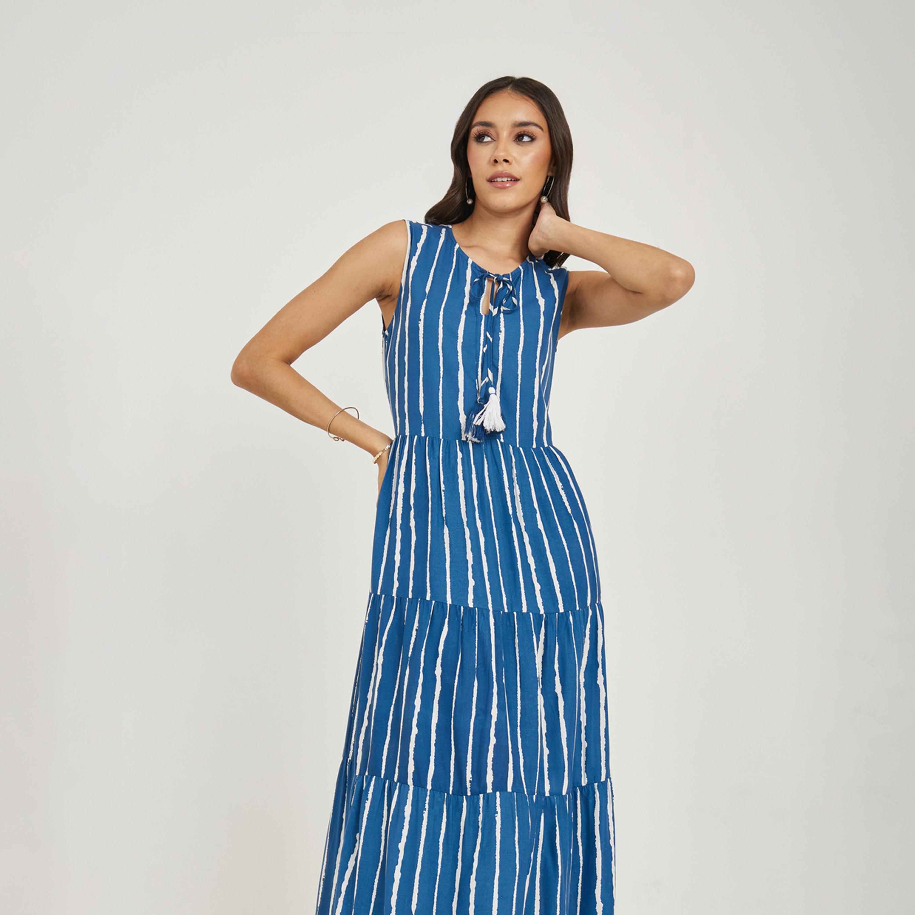 ستايلي - فستان ماكسي متعدد الطبقات بدون أكمام بطبعات كاملة-women-clothing-dresses-image-2