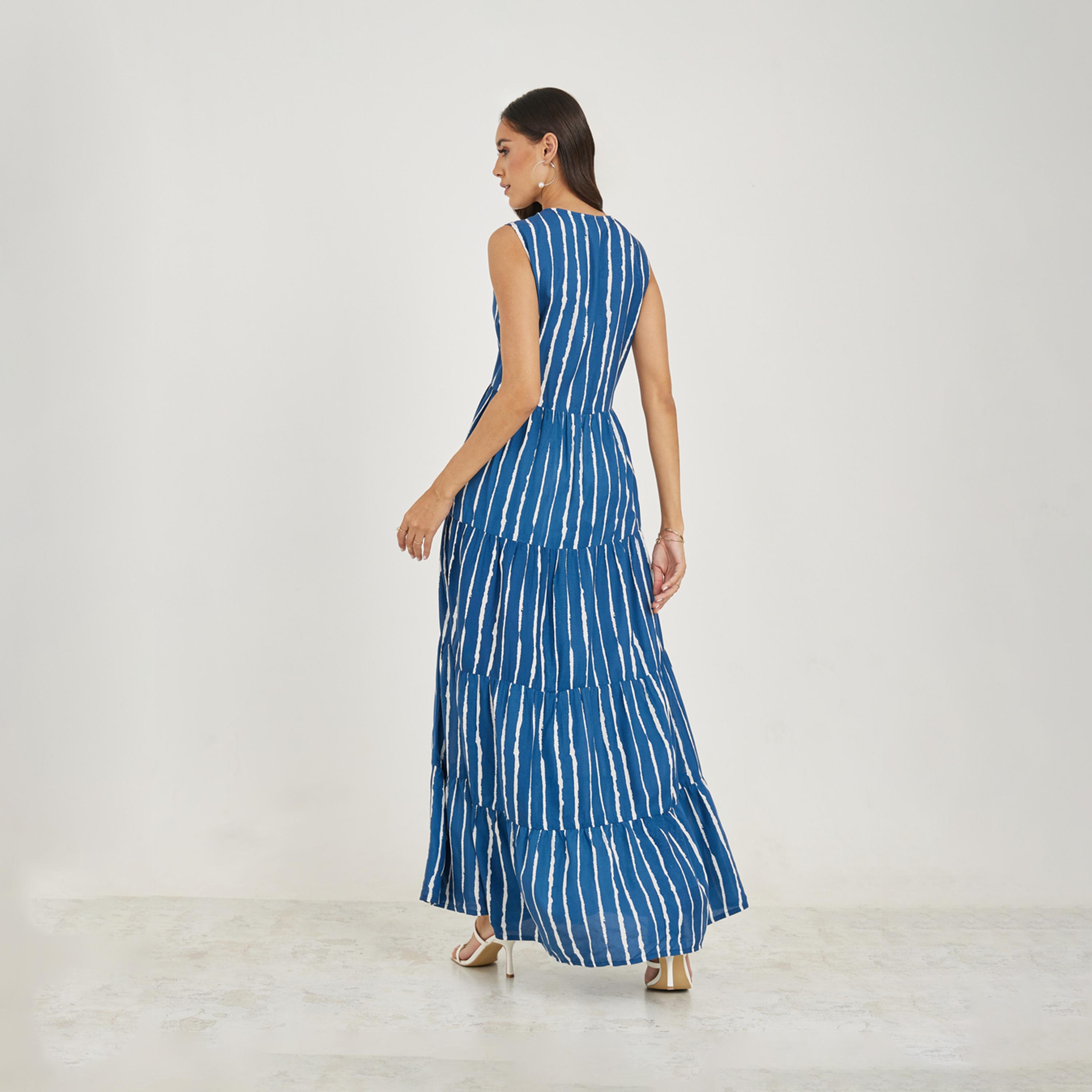 ستايلي - فستان ماكسي متعدد الطبقات بدون أكمام بطبعات كاملة-women-clothing-dresses-image-4