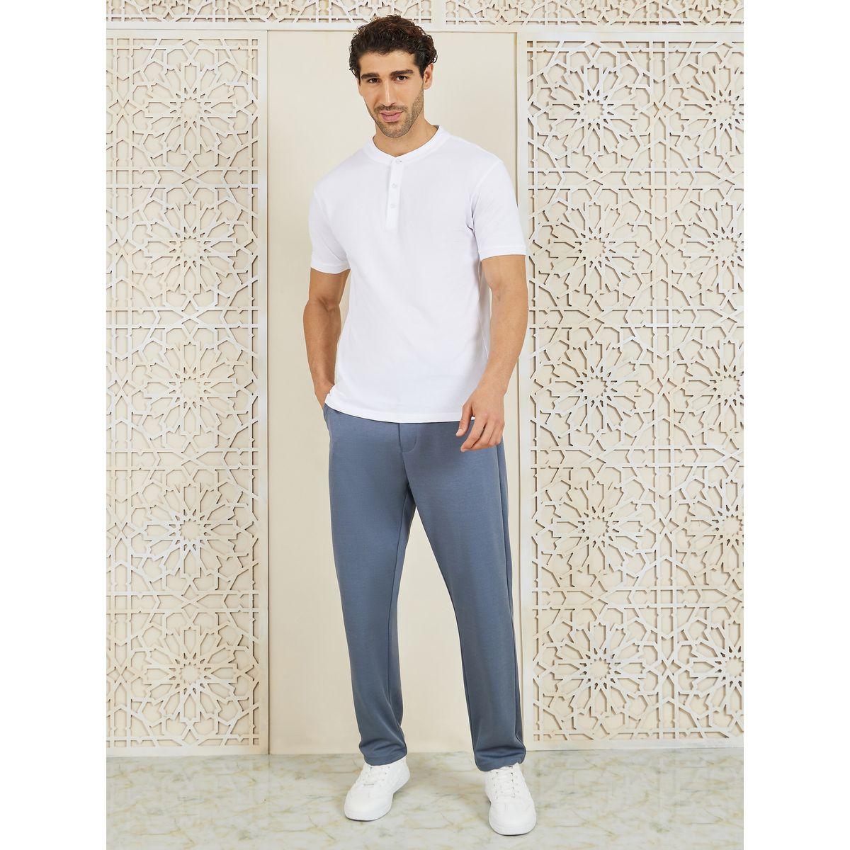 بنطال سادة محبوك بقصة سليم فت-men-clothing-bottoms-trousersandchinos-trousers-image-3