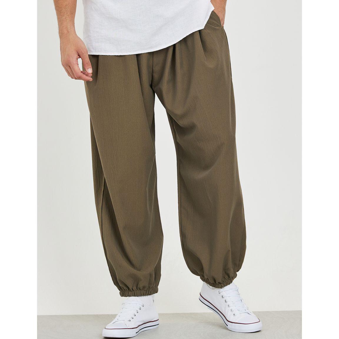 جوغر سادة بقصة هاريم وحواف مطاطية-men-clothing-bottoms-joggers-image-4