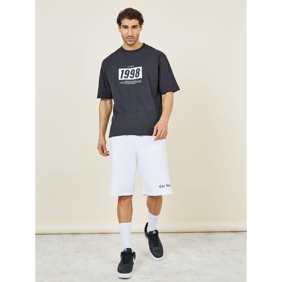 تيشيرت واسع بطبعة كتابة وتفاصيل مشطوفة-men-clothing-tshirtsandpolos-tshirts-image-2