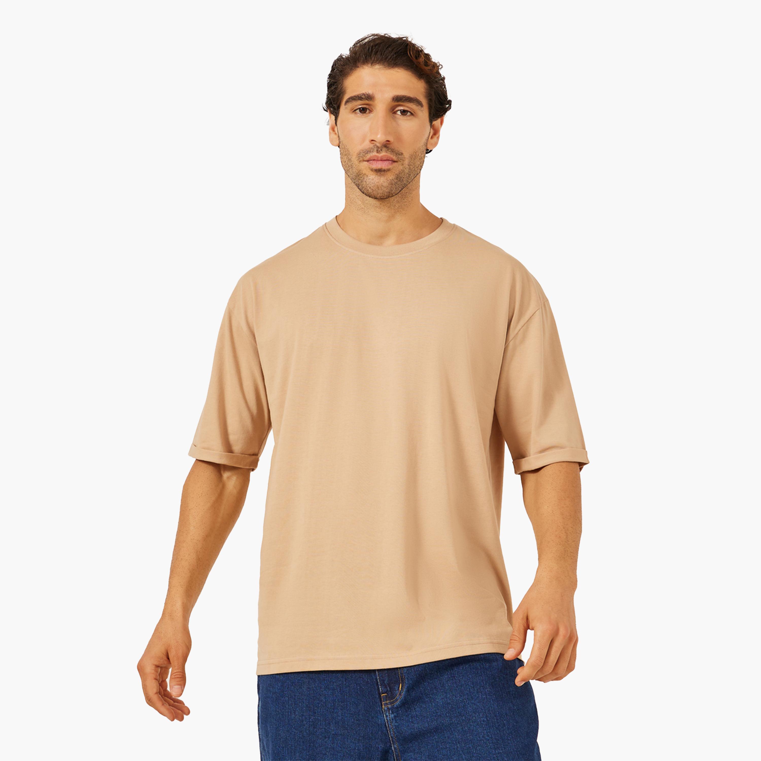 ستايلي - تي شيرت كبير الحجم بأكمام مطوية وفتحة جانبية-men-clothing-tshirtsandpolos-tshirts-image-1