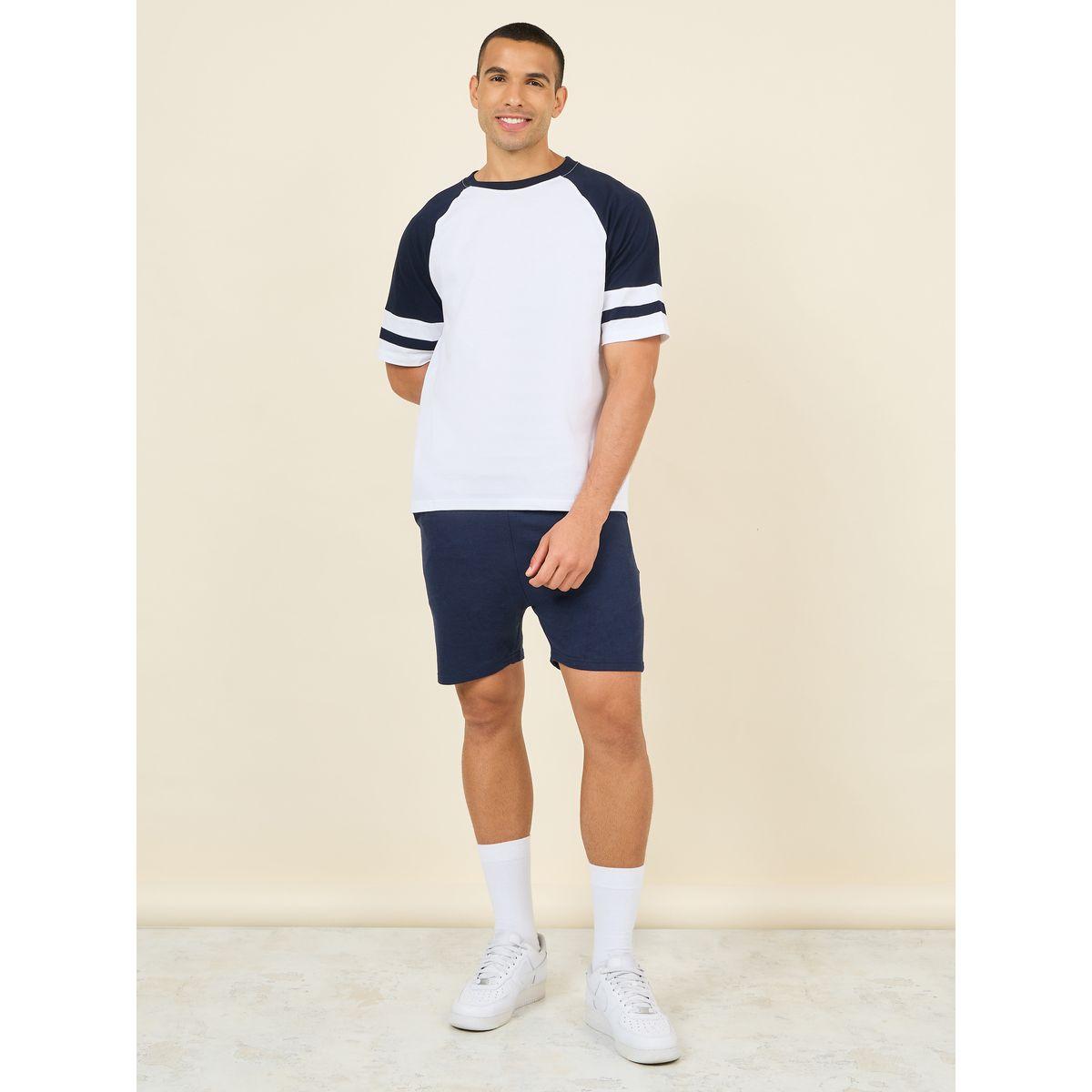 تيشيرت واسع باكمام ريجلان وطبعة فارسيتي-men-clothing-tshirtsandpolos-tshirts-image-2
