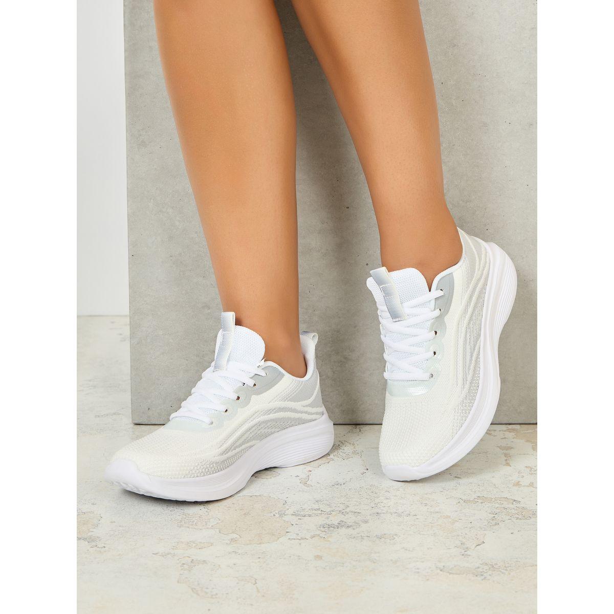 حذاء سنيكرز بتفاصيل بارزة الملمس-women-shoes-sneakers-image-1