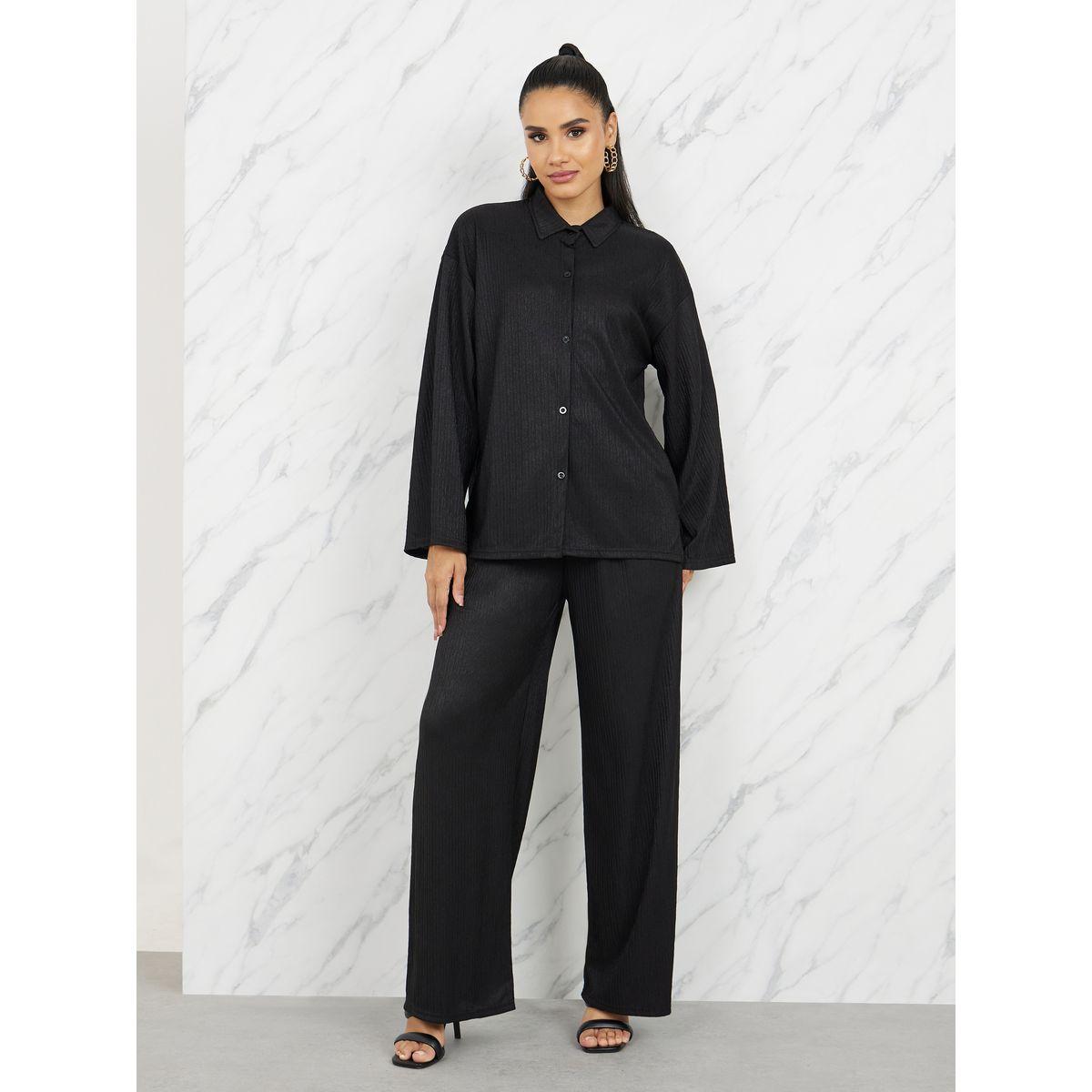 بنطال بارجل واسعة وبلوزة باكتاف منخفضة-women-clothing-coordsets-image-1