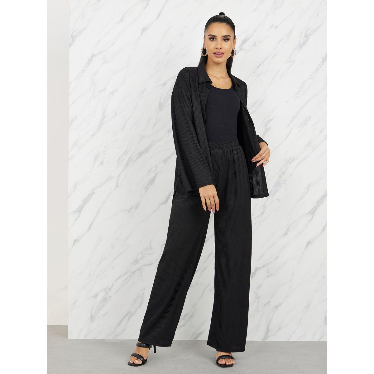 بنطال بارجل واسعة وبلوزة باكتاف منخفضة-women-clothing-coordsets-image-2