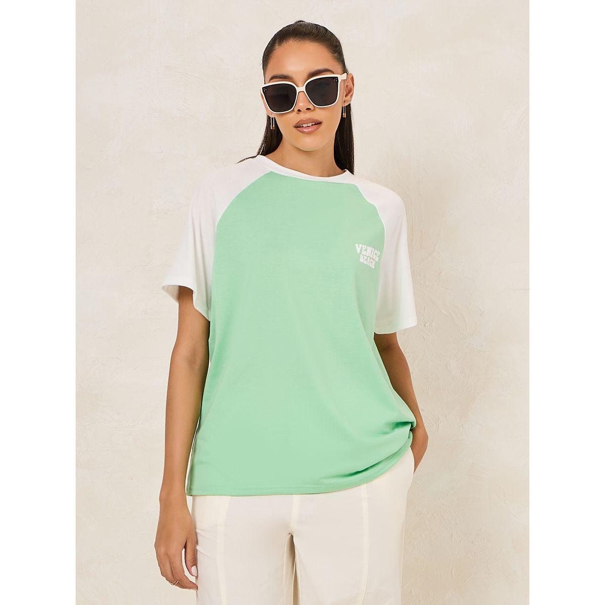 تيشيرت فضفاض مطبع بكتابة واكمام ريجلان-women-clothing-tshirts-image-1