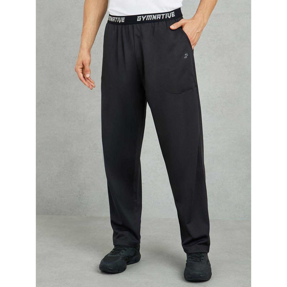 بنطال رياضي بقصة مريحة وخصر مطاطي-men-clothing-sportswearandactivewear-bottoms-joggers-image-1