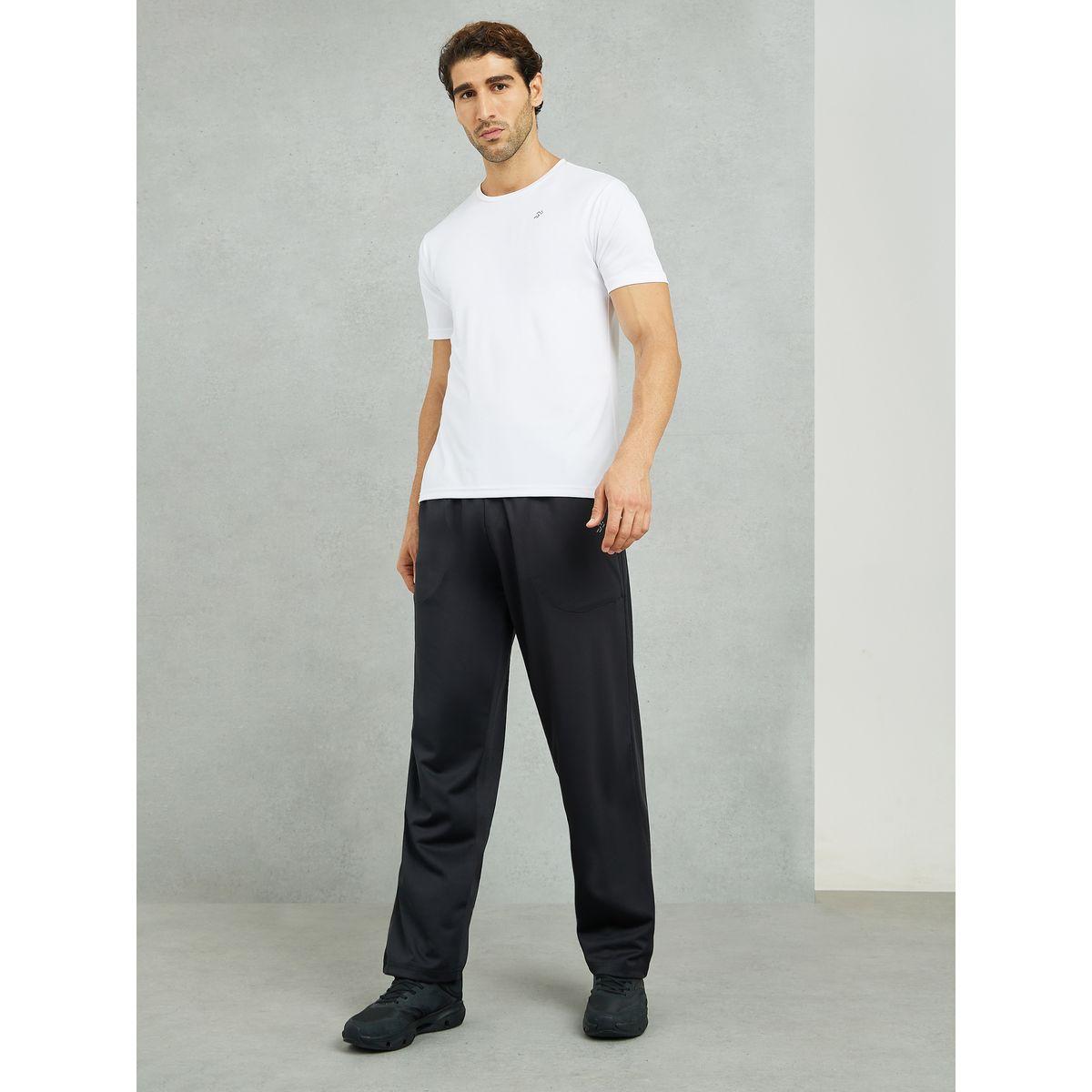 بنطال رياضي بقصة مريحة وخصر مطاطي-men-clothing-sportswearandactivewear-bottoms-joggers-image-2