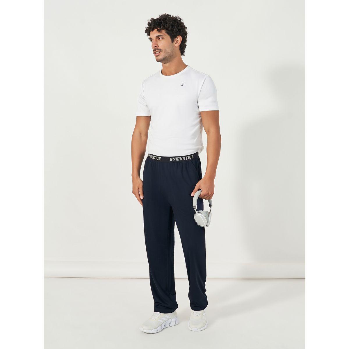بنطال رياضي بقصة مريحة وخصر بتفاصيل مُتباينة-men-clothing-sportswearandactivewear-bottoms-image-2