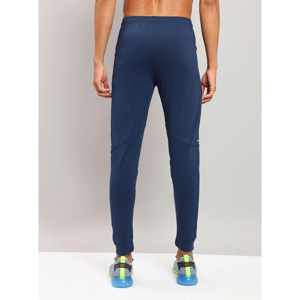 بنطال رياضي بتداخلات محزوزة وأساور تكنوسبورت × ستايلي-sports-men-clothing-bottoms-image-2