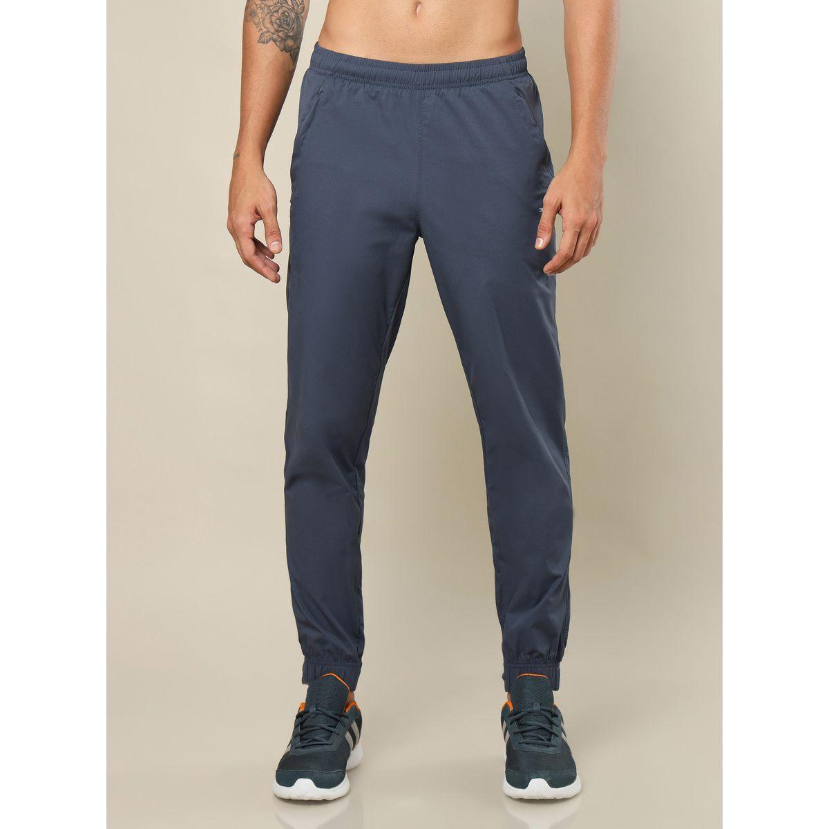 بنطال رياضي سادة منسوج مع أساور تكنوسبورت × ستايلي-men-clothing-sportswearandactivewear-bottoms-image-1
