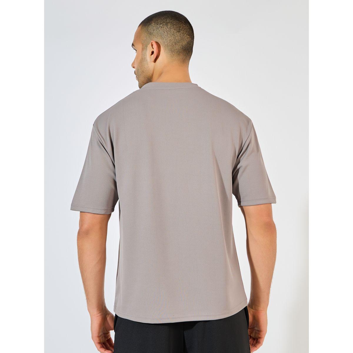 تيشيرت فضفاض محبوك بنسيج جاكار-men-clothing-sportswearandactivewear-tshirtsandpolos-image-1
