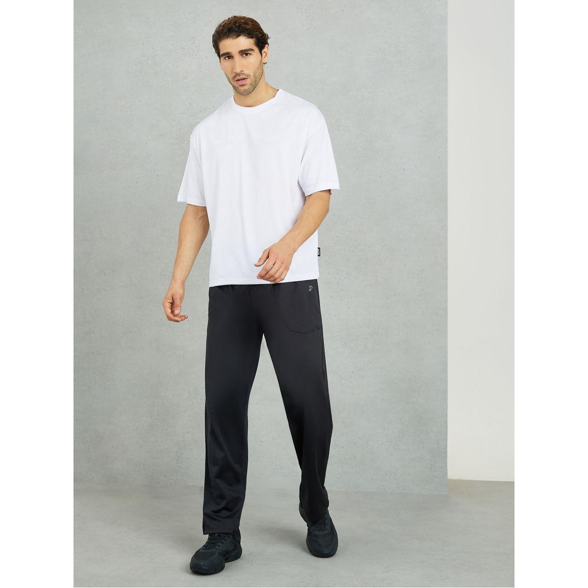 تيشيرت فضفاض بتفاصيل محبوكة-men-clothing-sportswearandactivewear-tshirtsandpolos-image-2