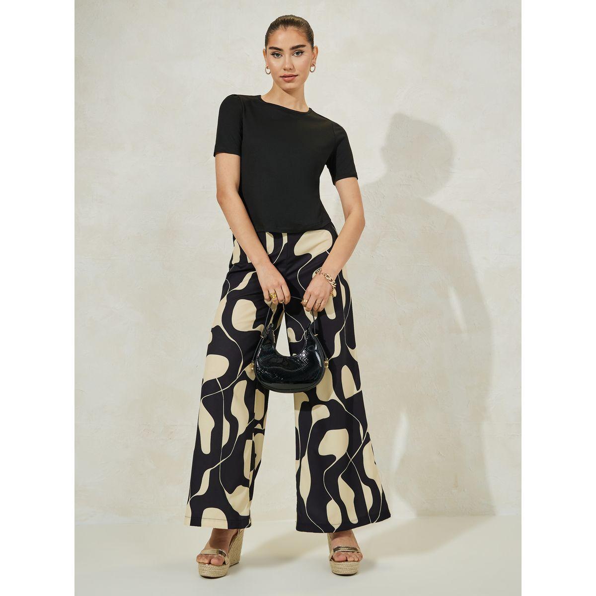 Styli Solid Knit Top & Printed Flared Pants Co-Ords-women-clothing-coordsets-image-1