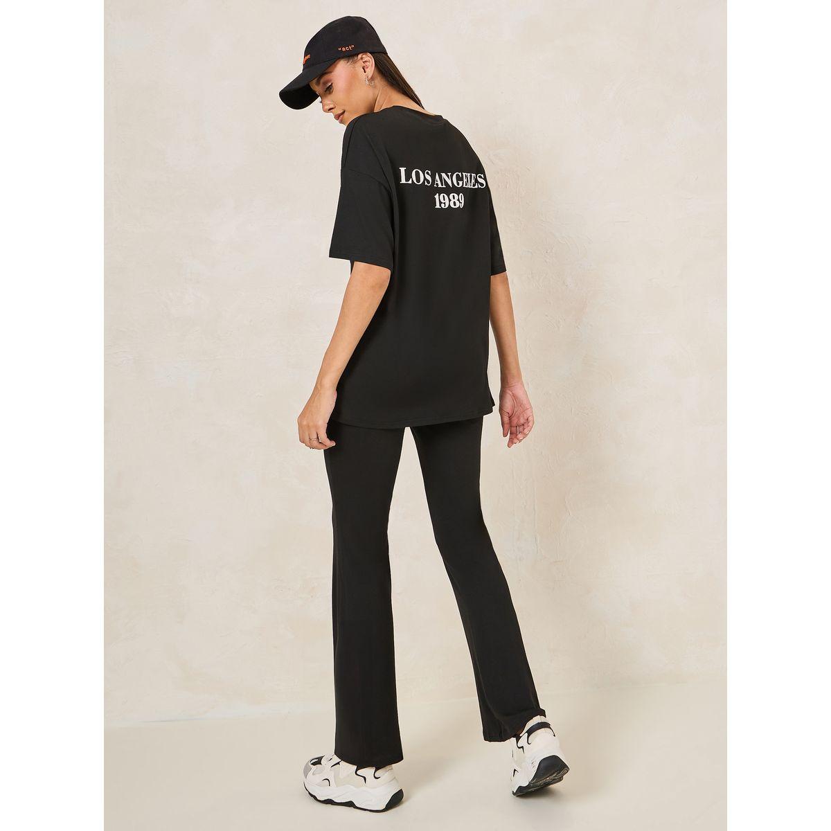Styli Back Slogan Print Oversized T-Shirt & Flared Joggers Co-Ords-women-clothing-coordsets-image-1
