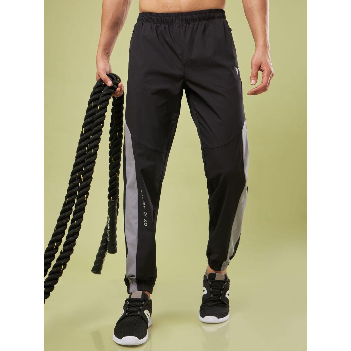 بنطال رياضي بنمط كتل الالوان وحواف مكبلة-men-clothing-sportswearandactivewear-bottoms-image-1