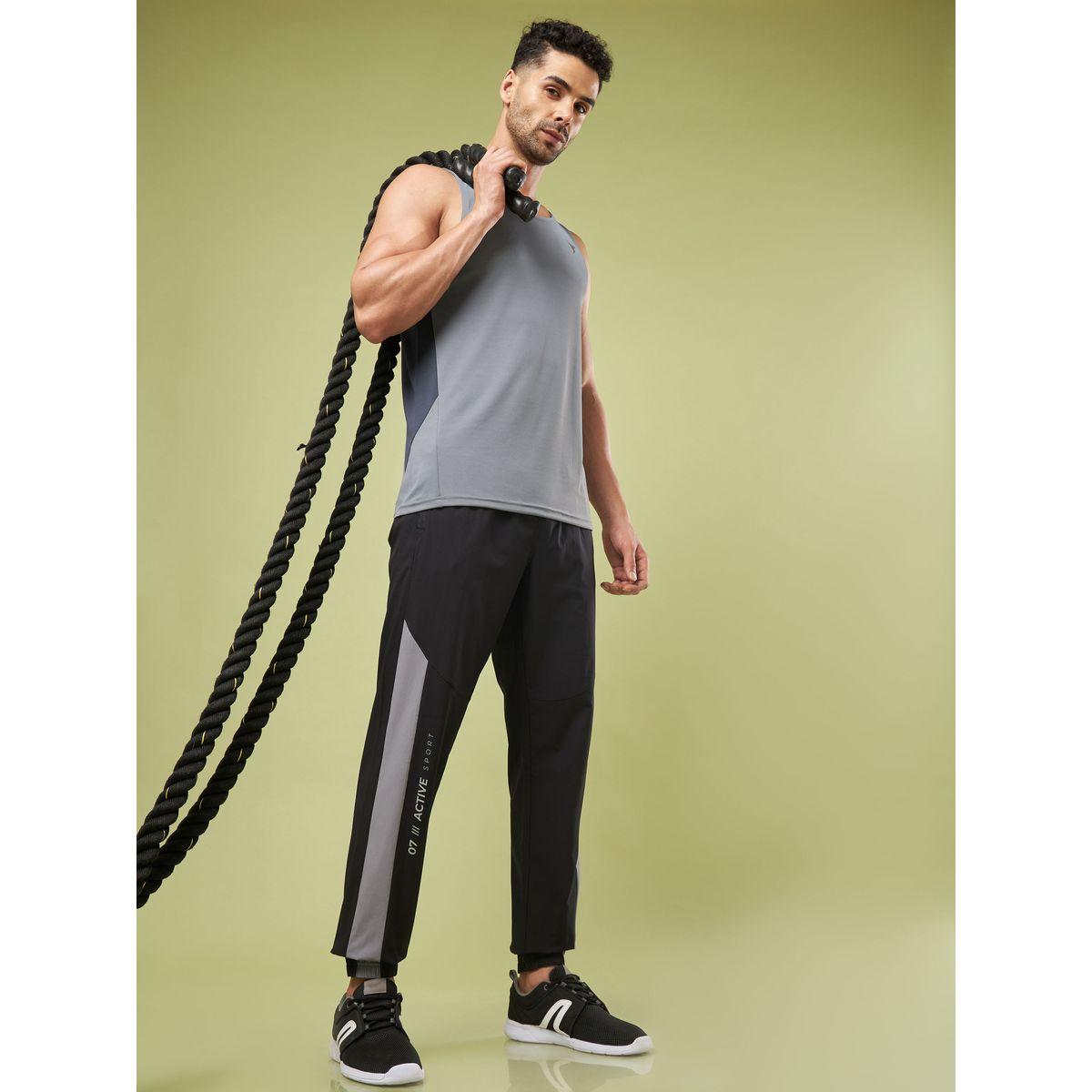 بنطال رياضي بنمط كتل الالوان وحواف مكبلة-men-clothing-sportswearandactivewear-bottoms-image-2