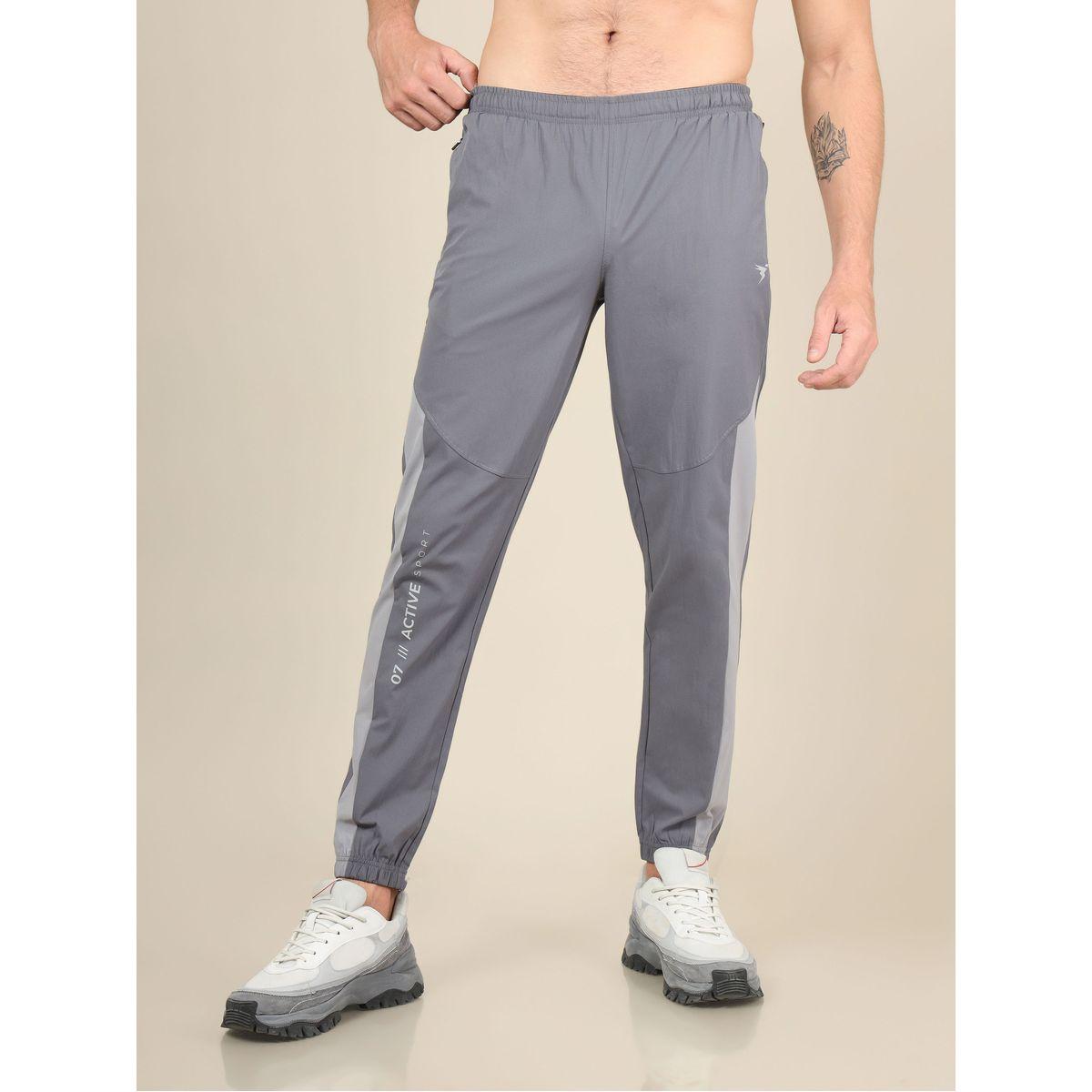 بنطال رياضي بنمط كتل الالوان وحواف مكبلة-men-clothing-sportswearandactivewear-bottoms-image-1