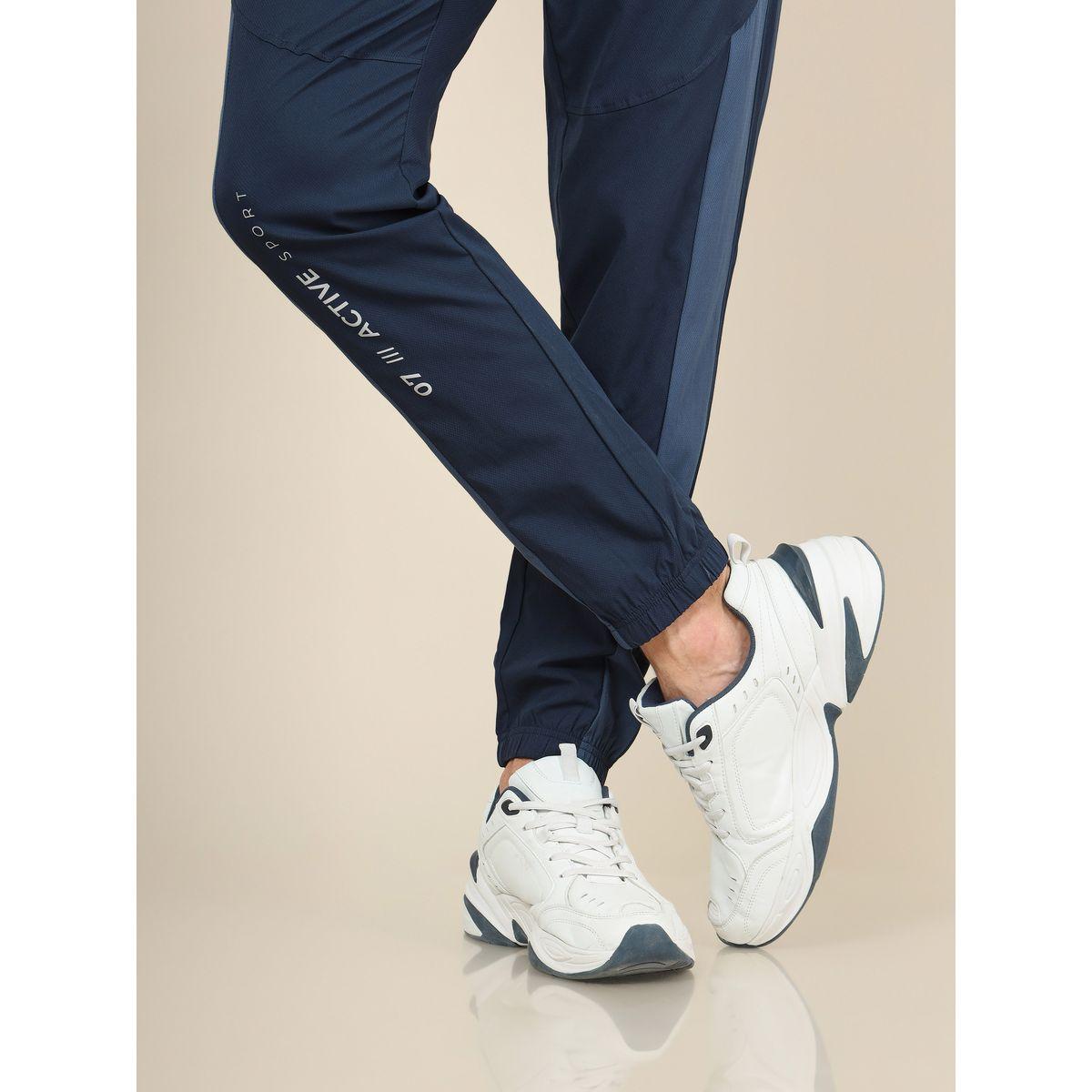بنطال رياضي سادة مع اساور مطاطية تكنوسبورت × ستايلي-men-clothing-sportswearandactivewear-bottoms-image-4