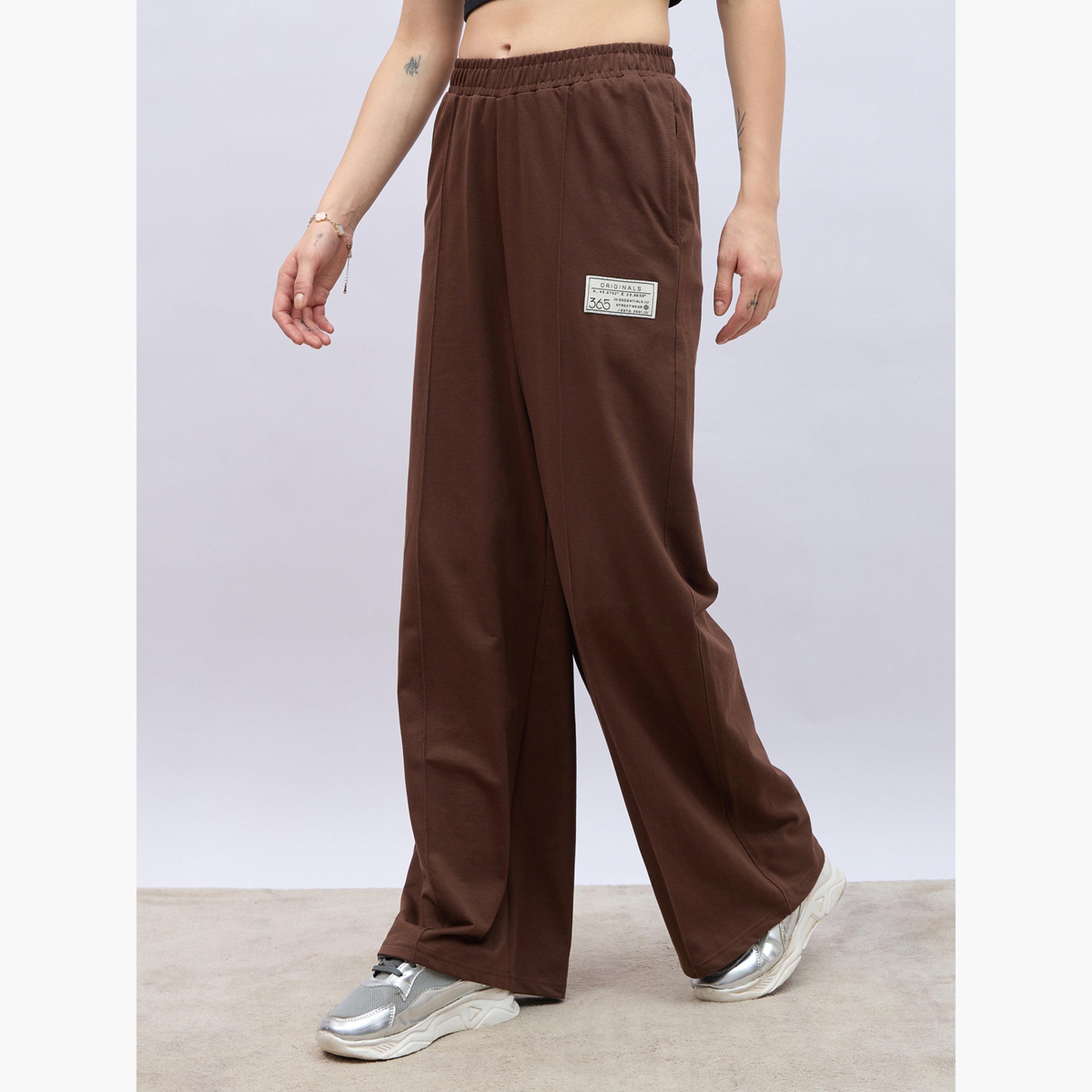 جوغر بأرجل واسعة وتفاصيل شارة-women-clothing-bottoms-joggers-image-3