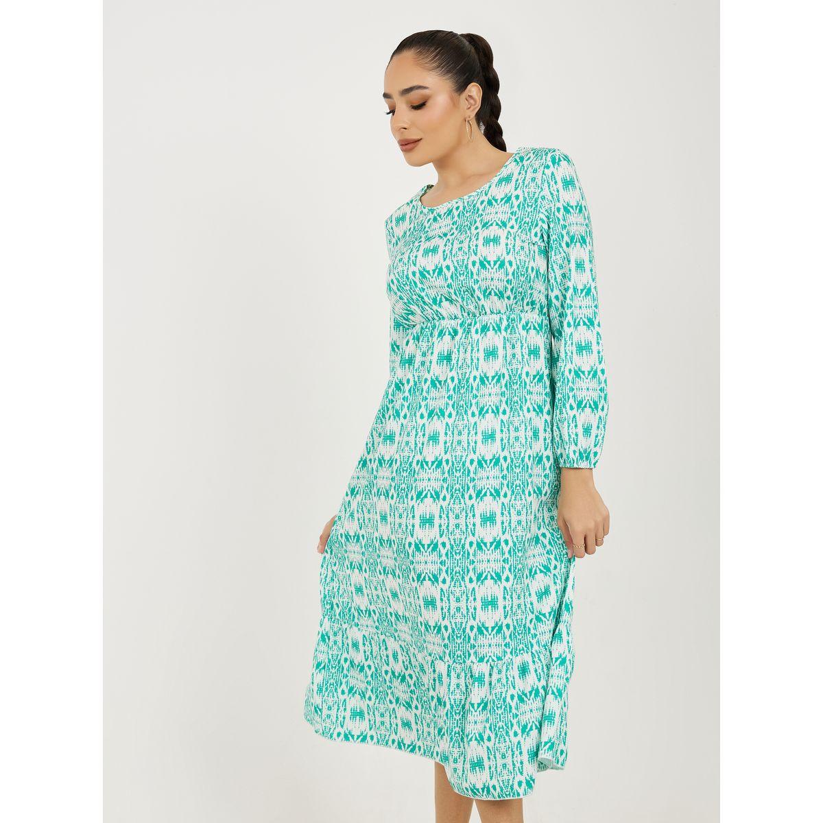 فستان ميدي مطبع بالكامل مع ياقة دائرية-women-clothing-dresses-image-1
