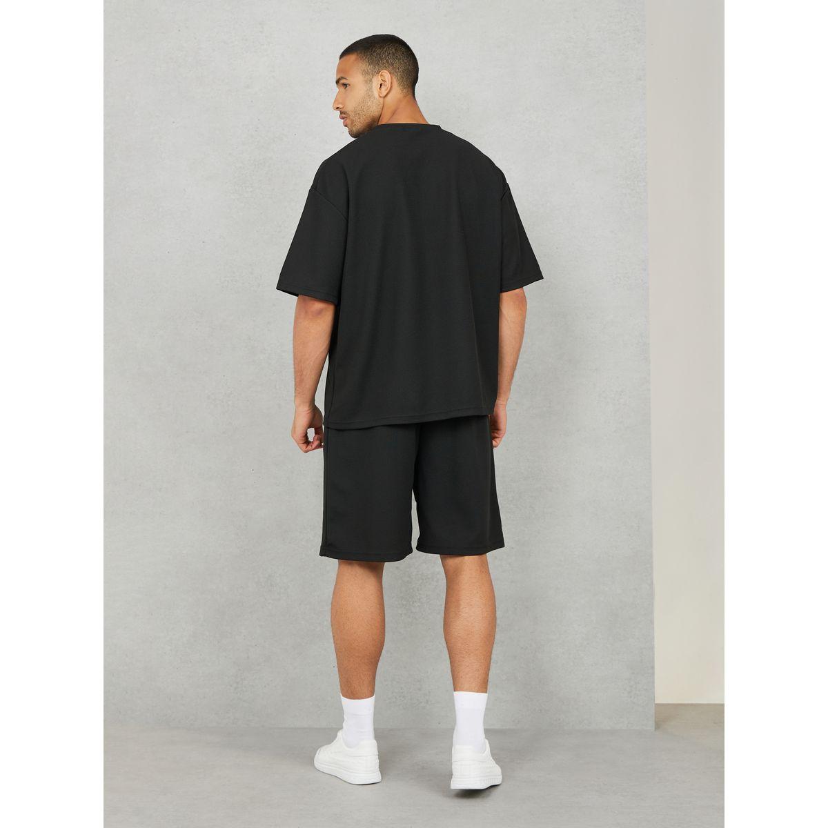 مجموعة من شورت وتيشيرت سادة واسع-men-clothing-coordsets-image-4
