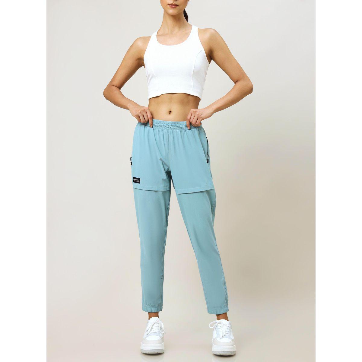 جوغر سادة بجيوب مع سحَّاب غلق تكنوسبورت × ستايلي-women-clothing-bottoms-joggers-image-1