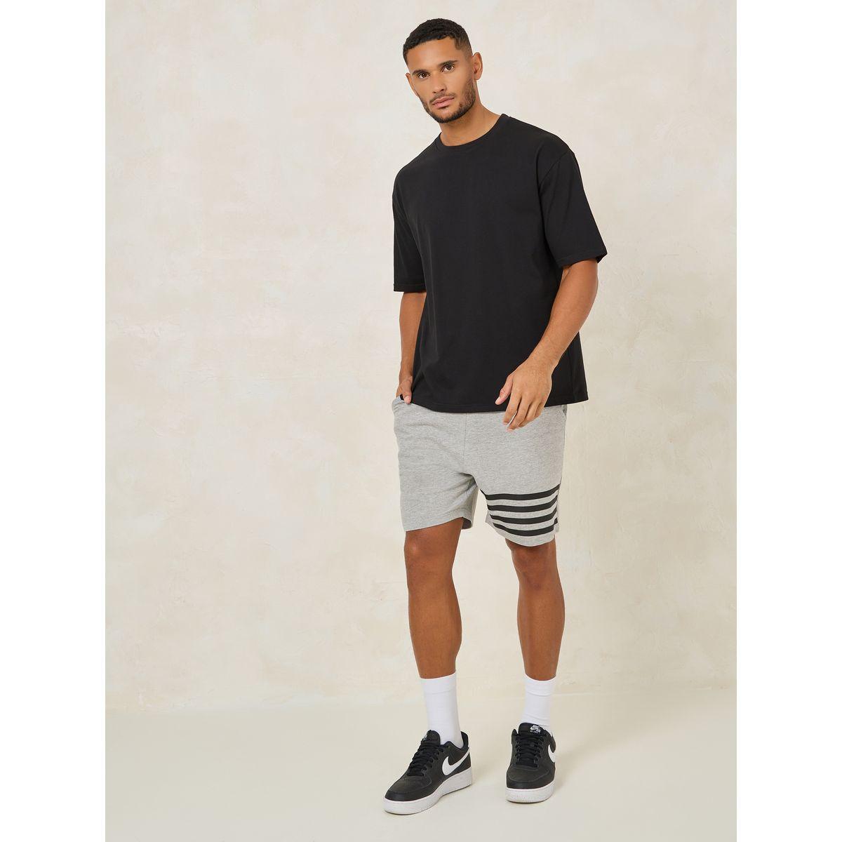 تيشيرت فضفاض مطبع بطبعة كتابة-men-clothing-tshirtsandpolos-tshirts-image-2